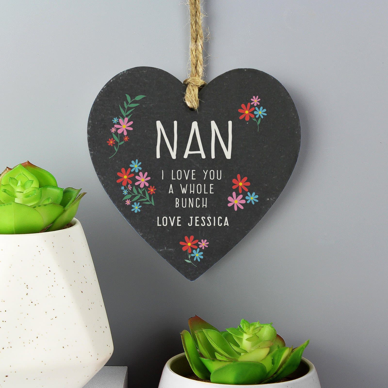 Hanging slate heart printed with I love you a whole bunch and a name