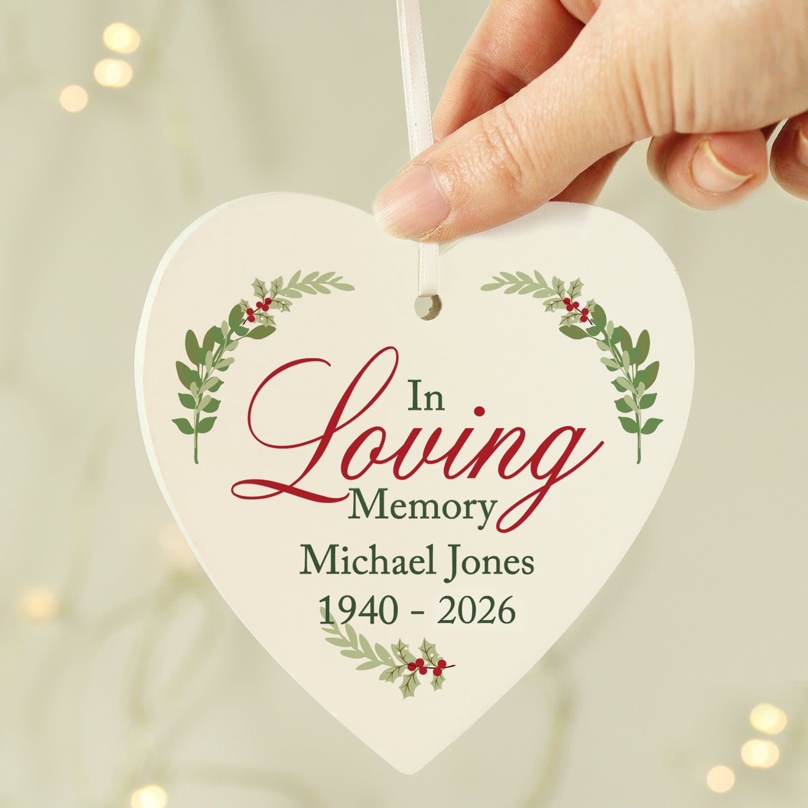 Wooden heart decoration personalised with in loving memory text and ribbon