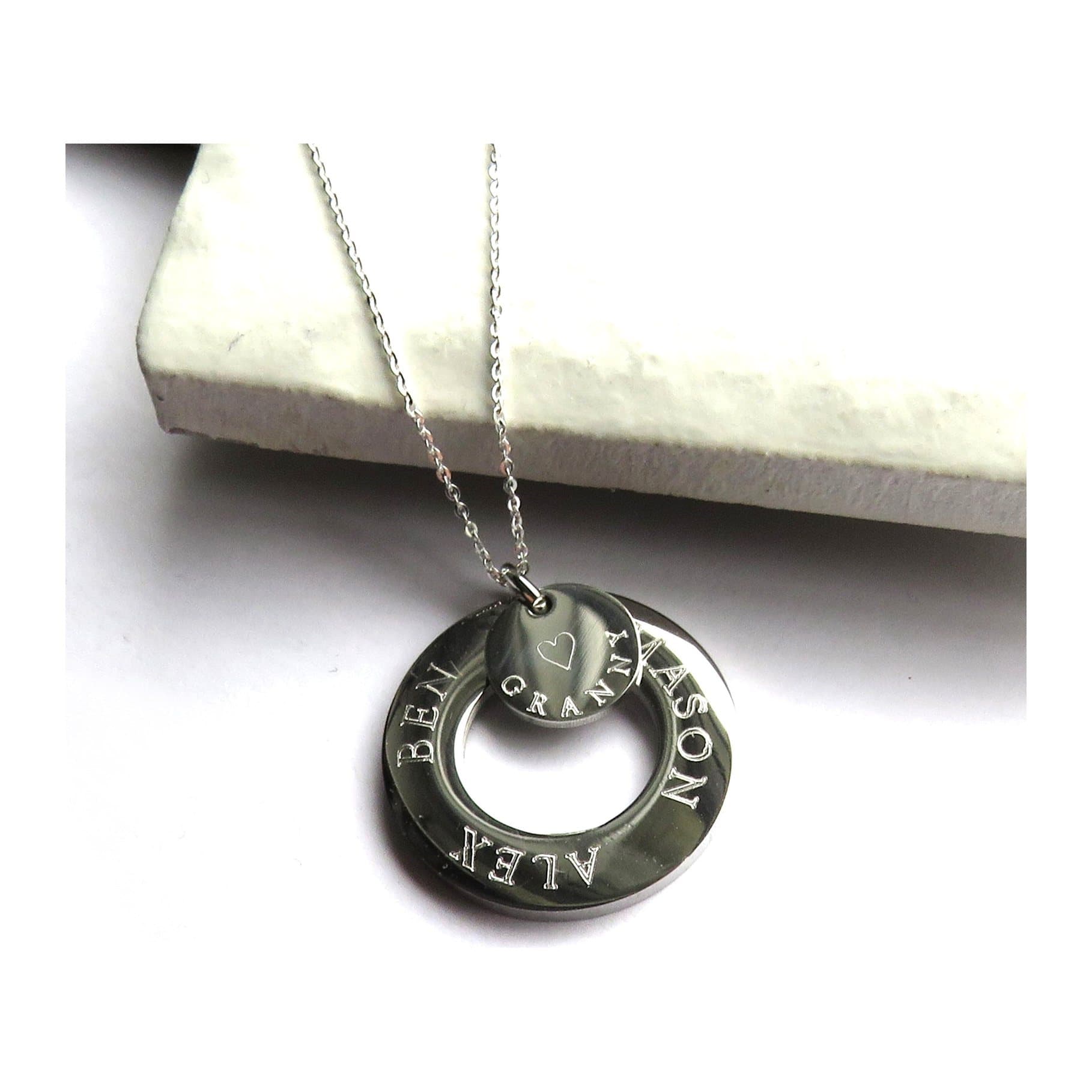 Personalised infinity necklace with an infinity disc and a mini disc on a chain