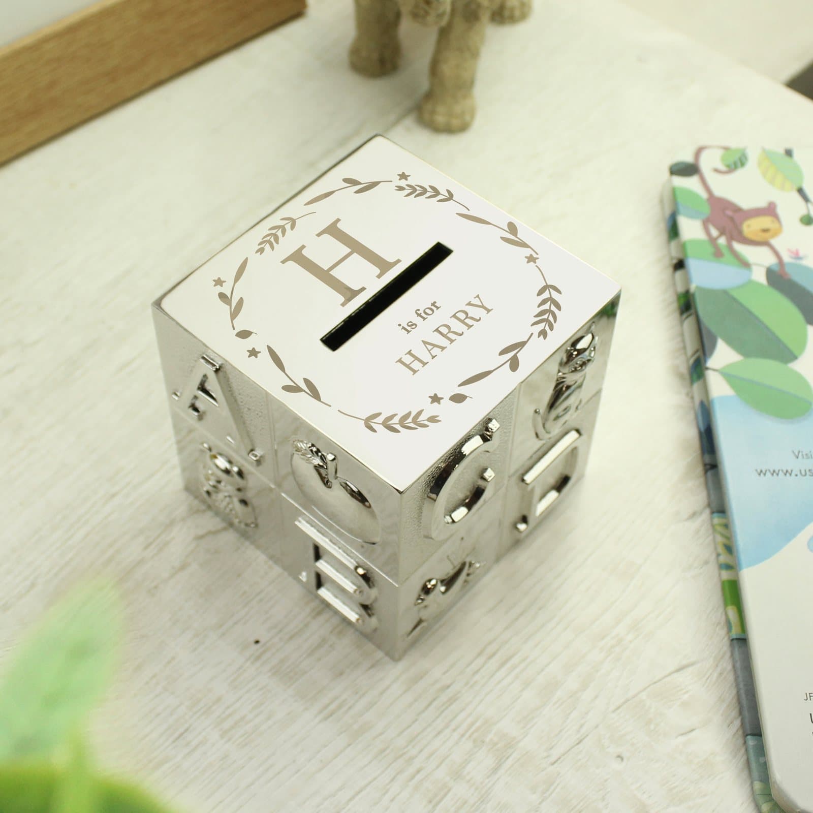 Personalised ABC money box with an initial and name