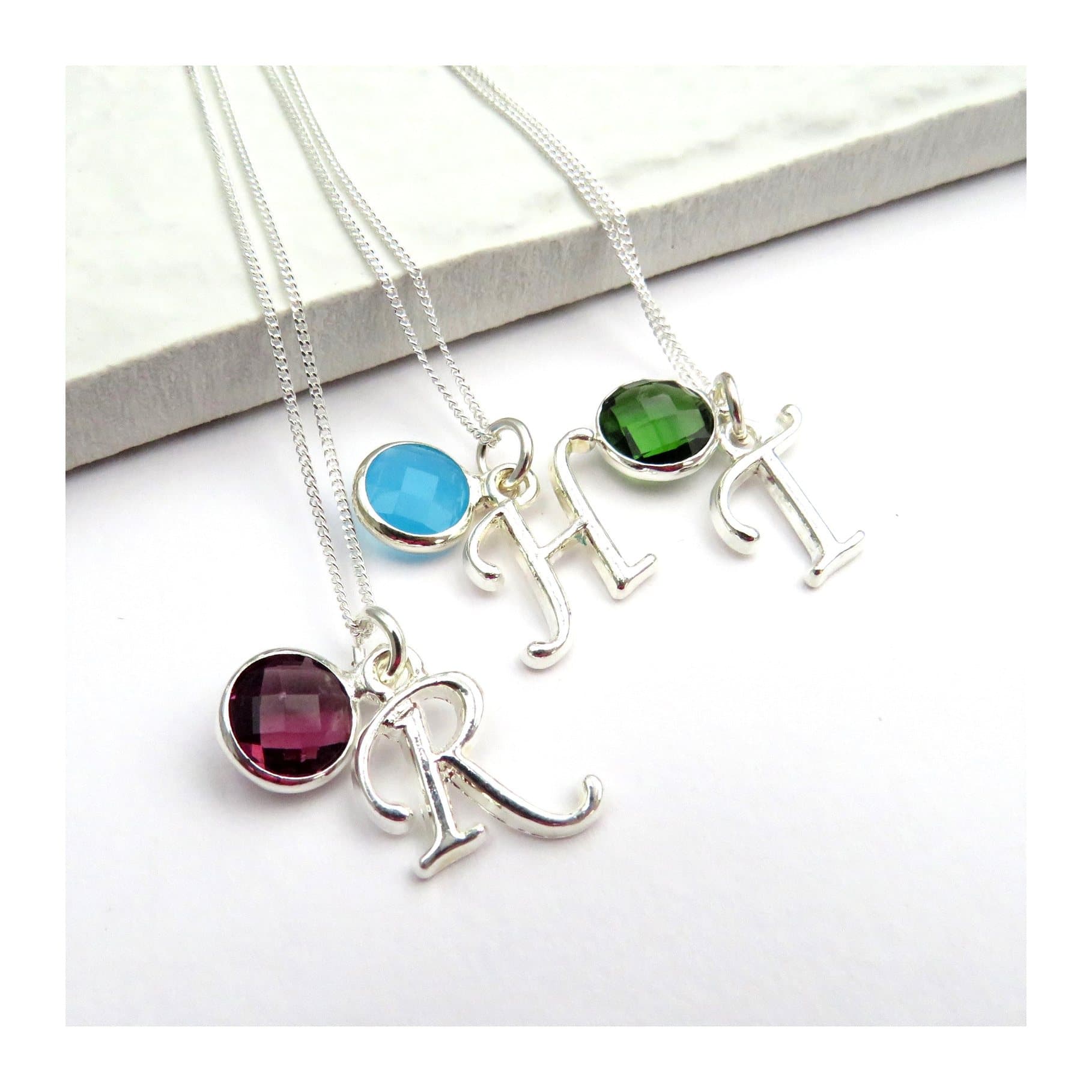 Sterling silver initial necklace with a coloured birthstone charm