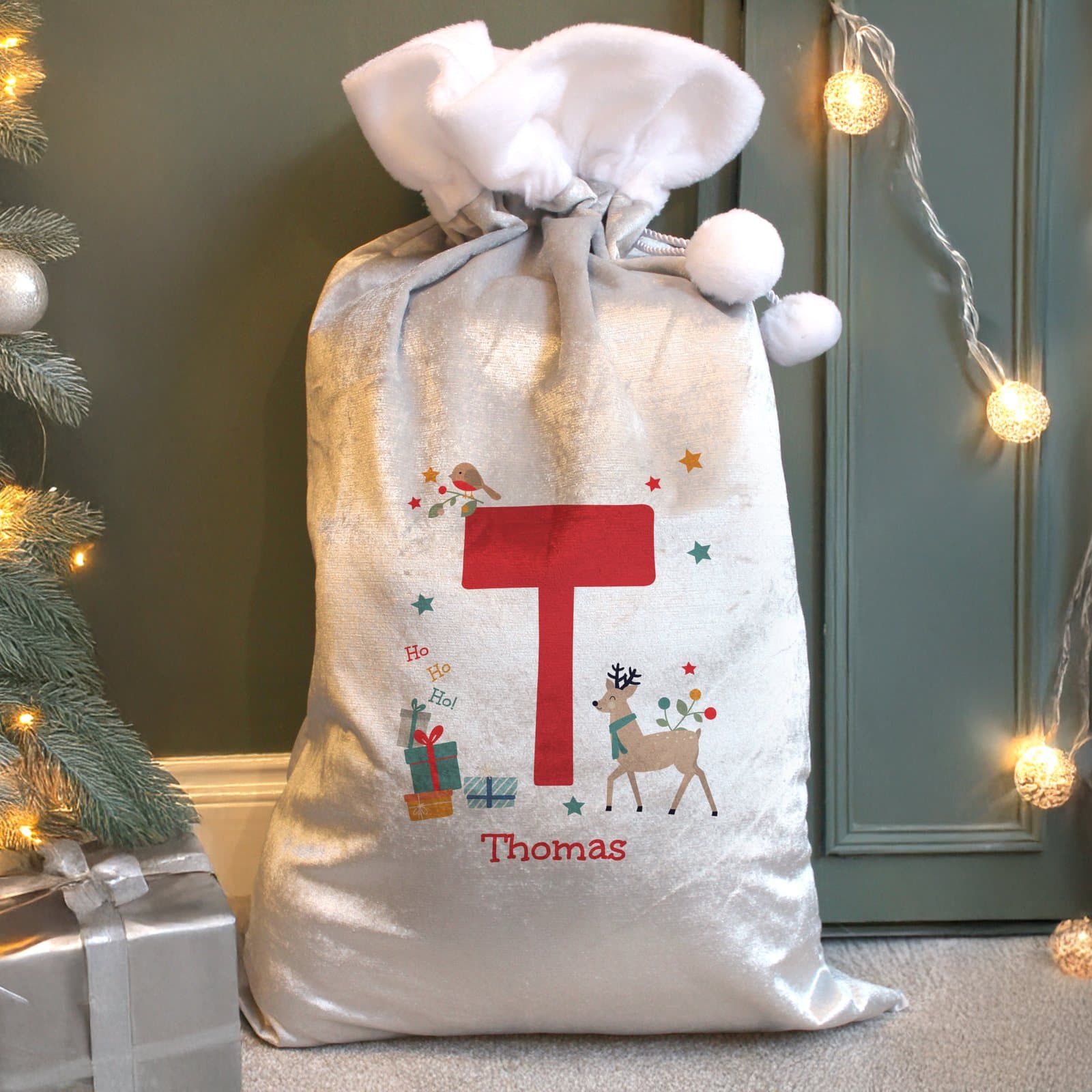 Personalised reindeer Christmas sack in fleece with an initial and name