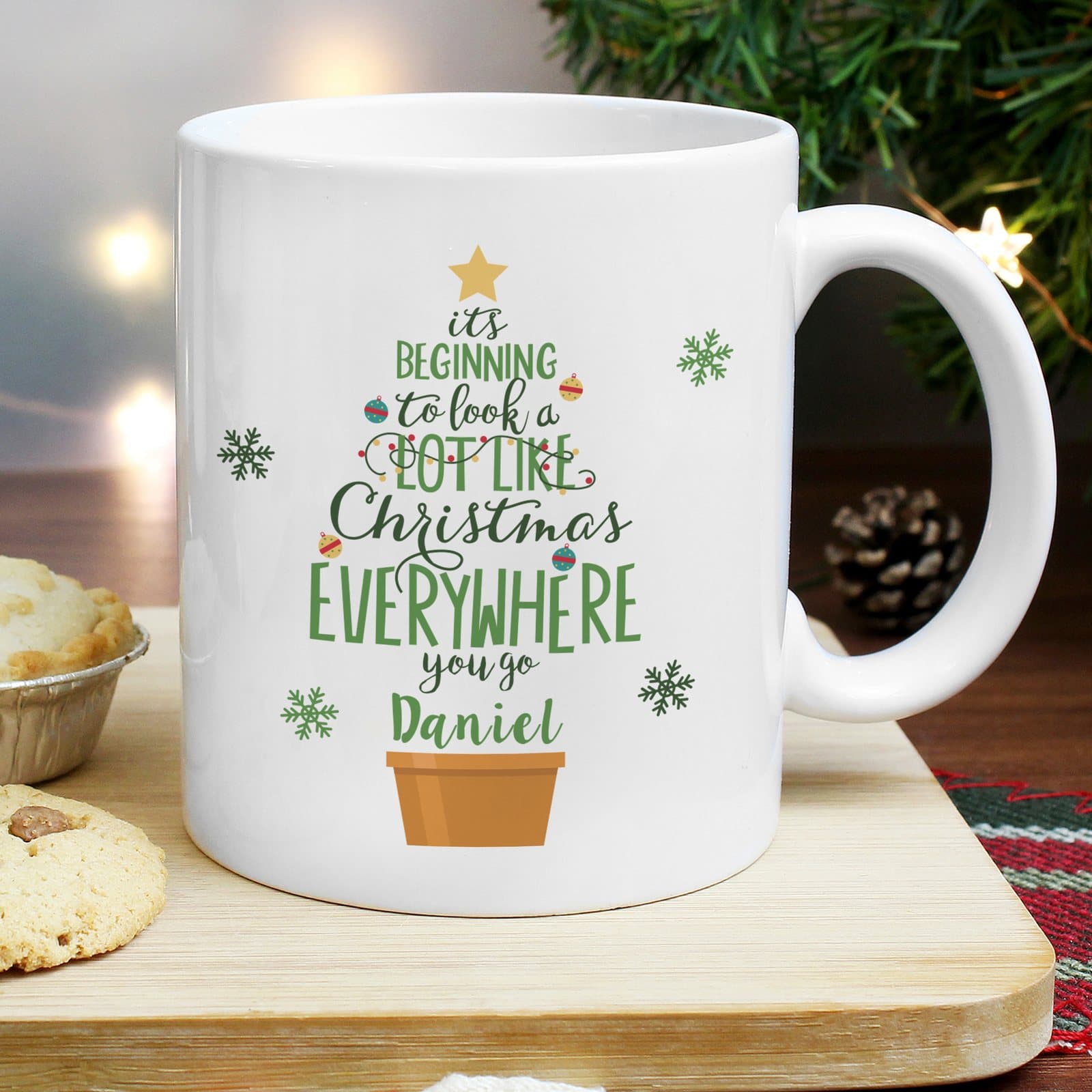 Christmas mug with a line from a Christmas jingle and a personalised name