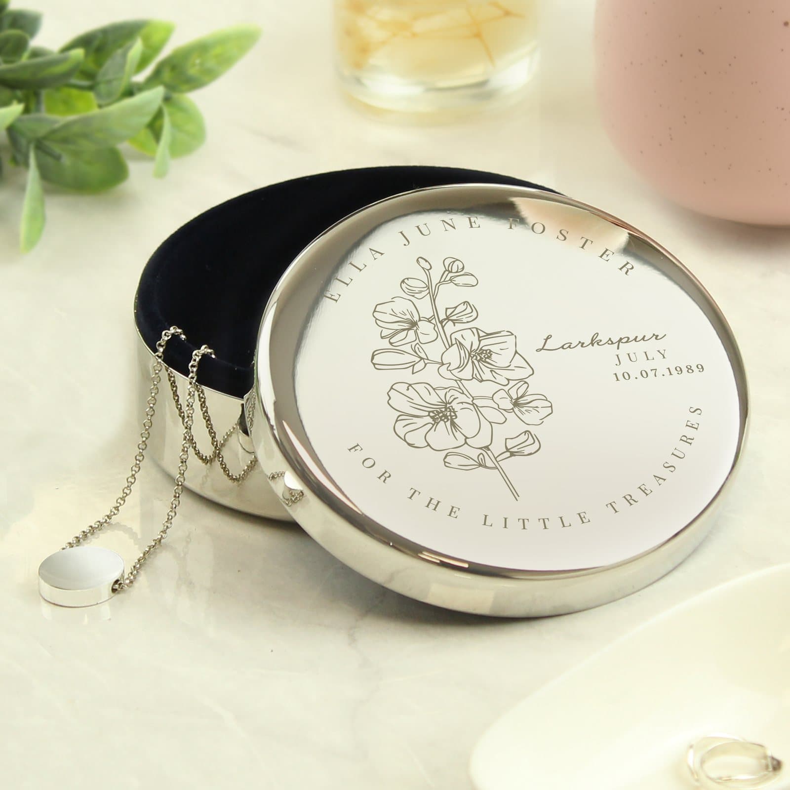 Round nickel plated trinket box with a larkspur illustration