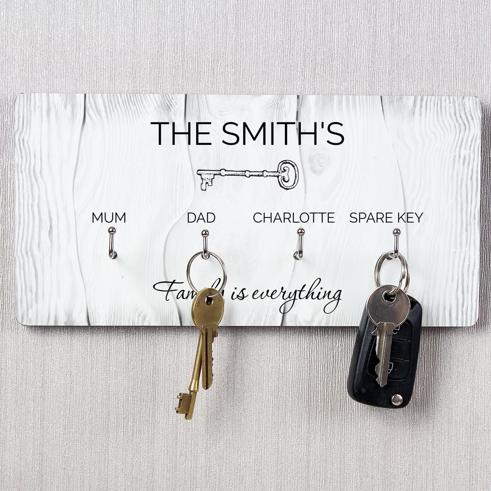 High gloss wooden key hanger with four hooks and personalised text