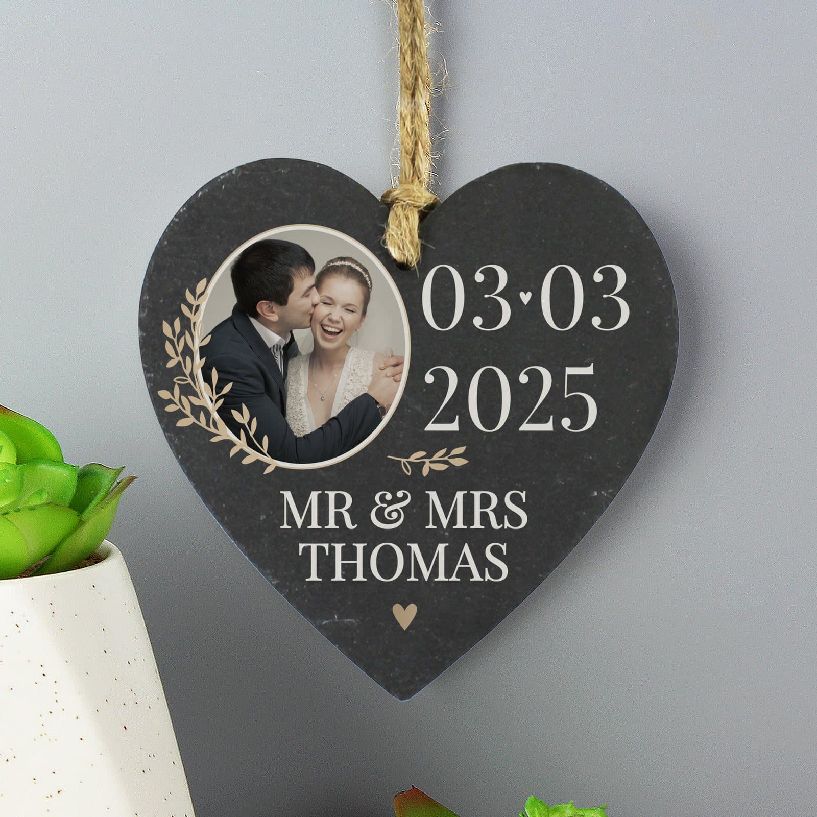 Hanging slate heart decoration with a photo, a date and two lines of text