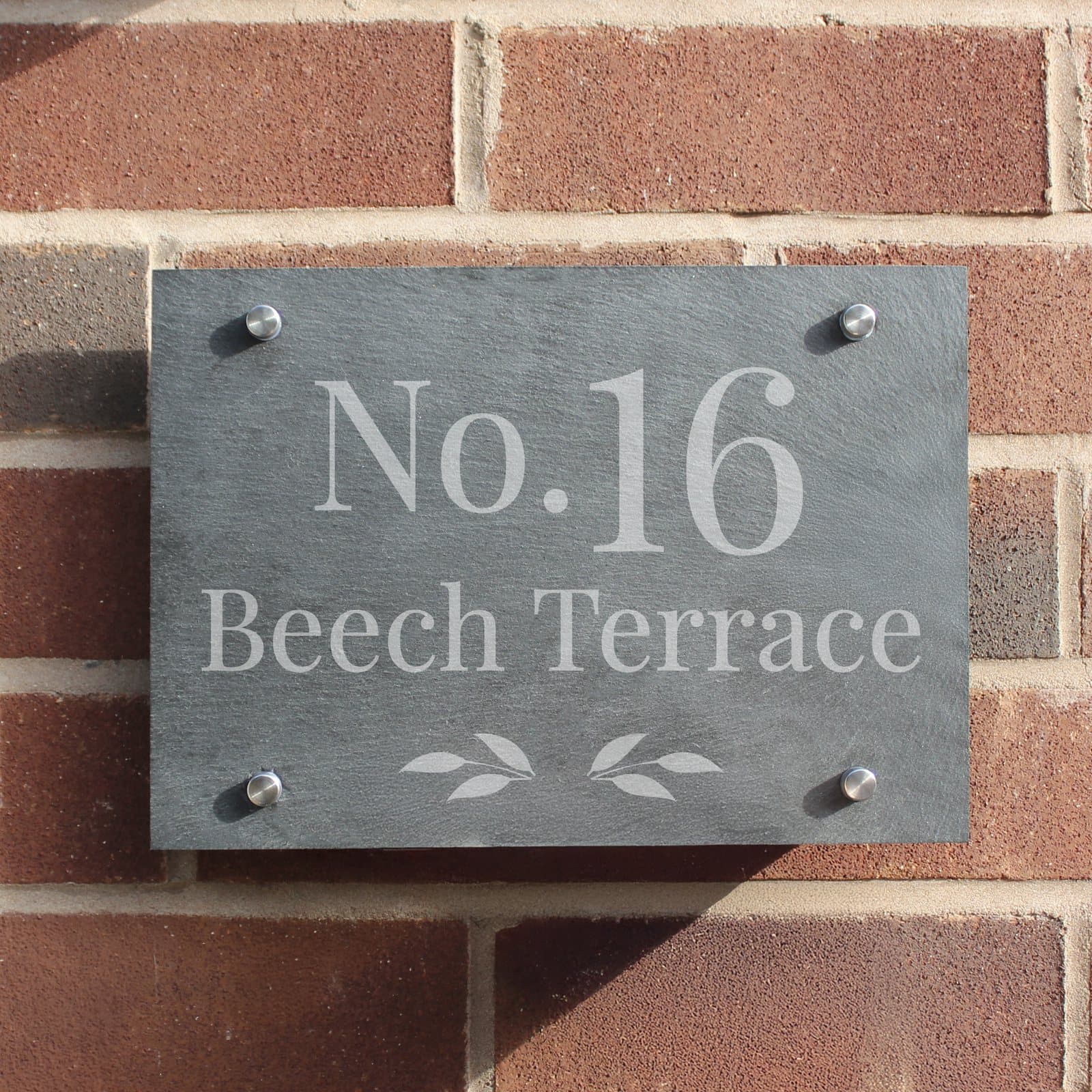 Slate house sign with a leafy effect and personalised text