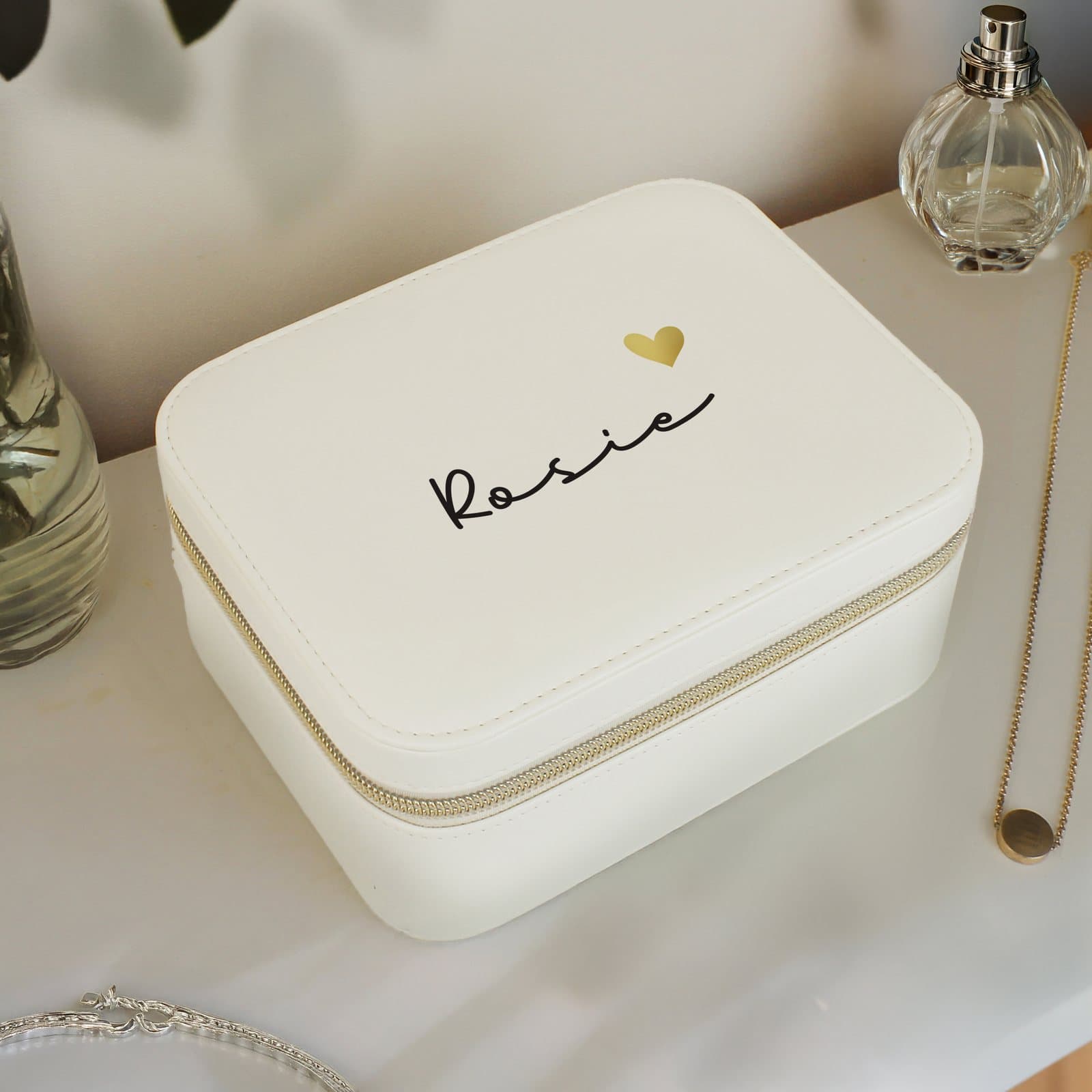 Faux leather jewellery box with a bow detail
