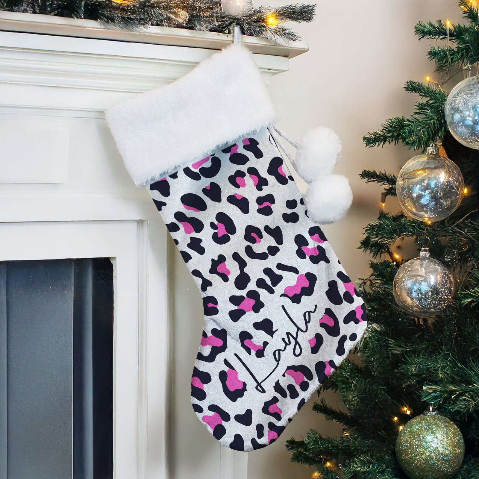 Personalised leopard print velvet Christmas stocking with plush white cuff