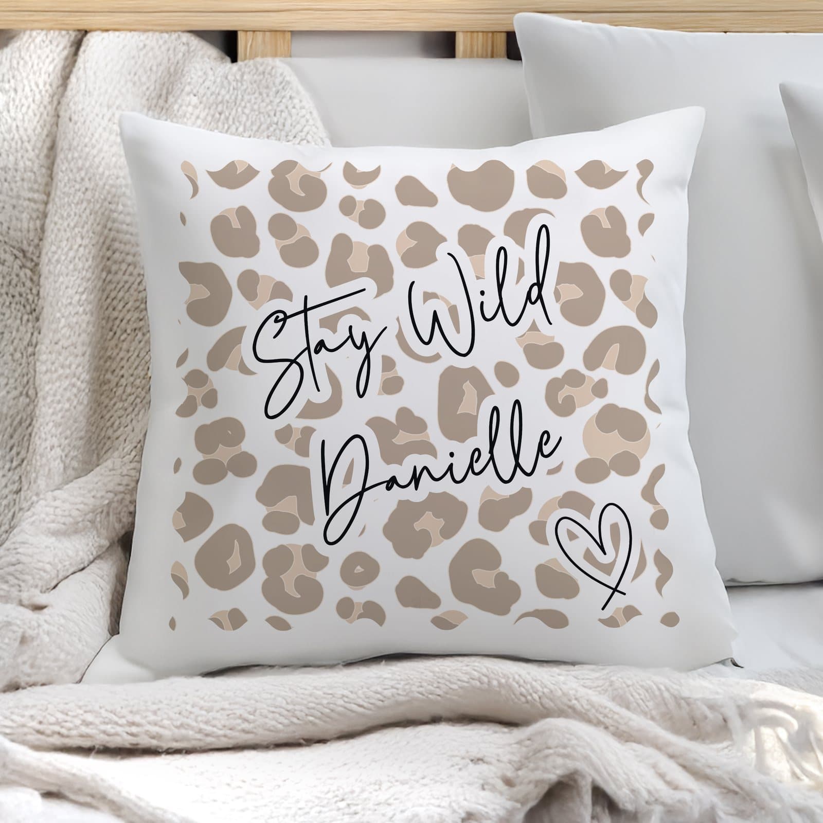 Leopard print cushion personalised with two lines of text