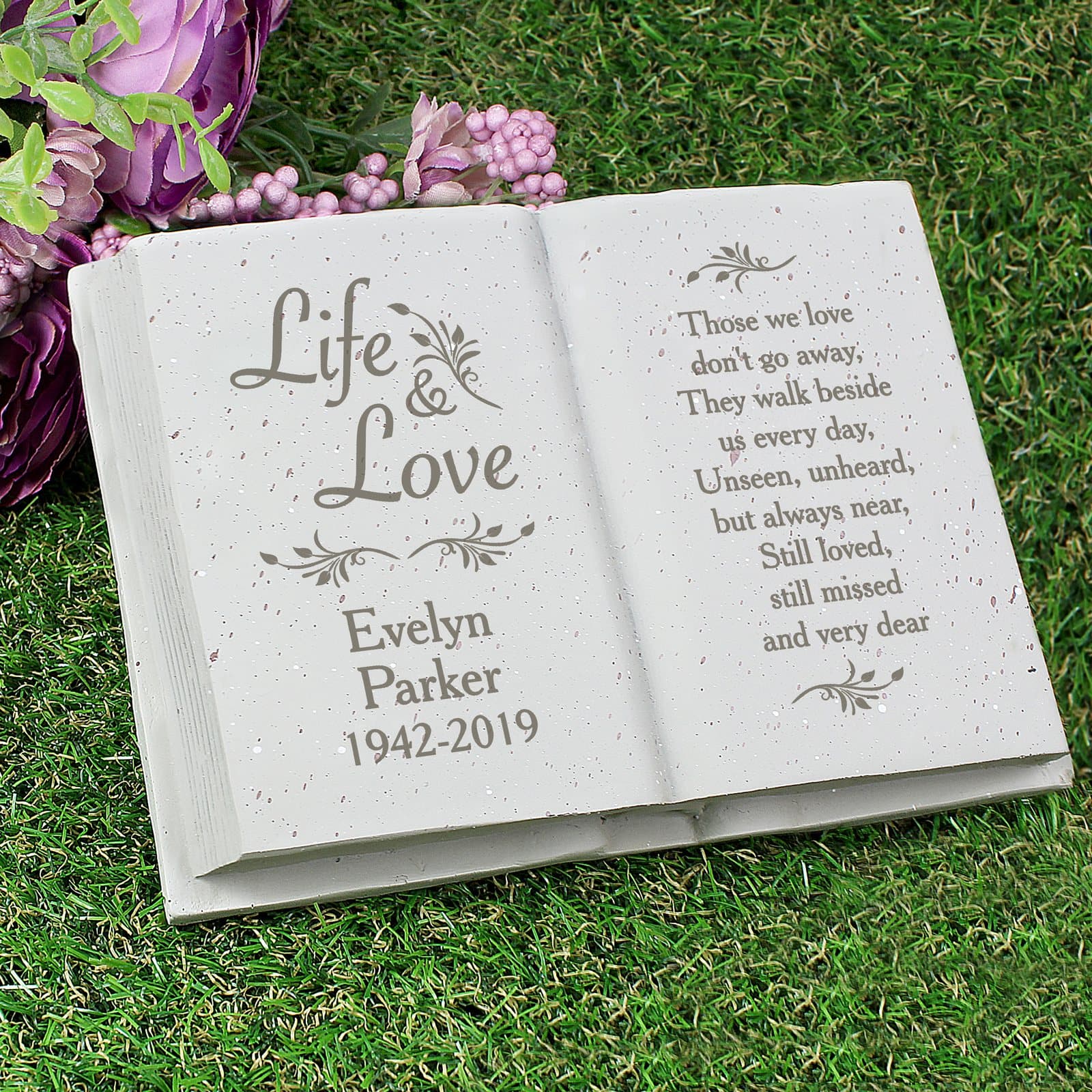 Resin memorial book ornament with personalised lines on the left and a poem on the right