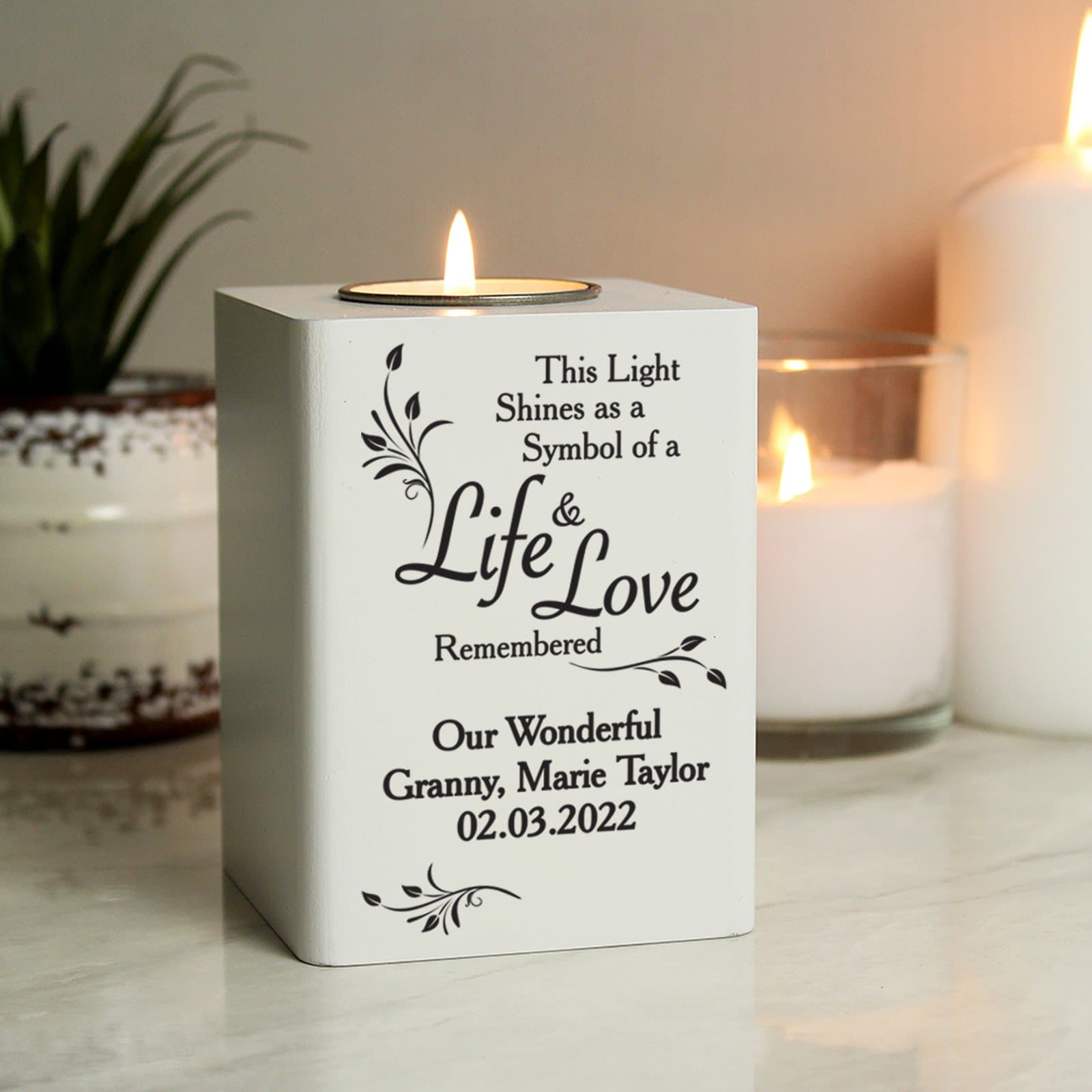 White wooden tea light holder with personalised message lines