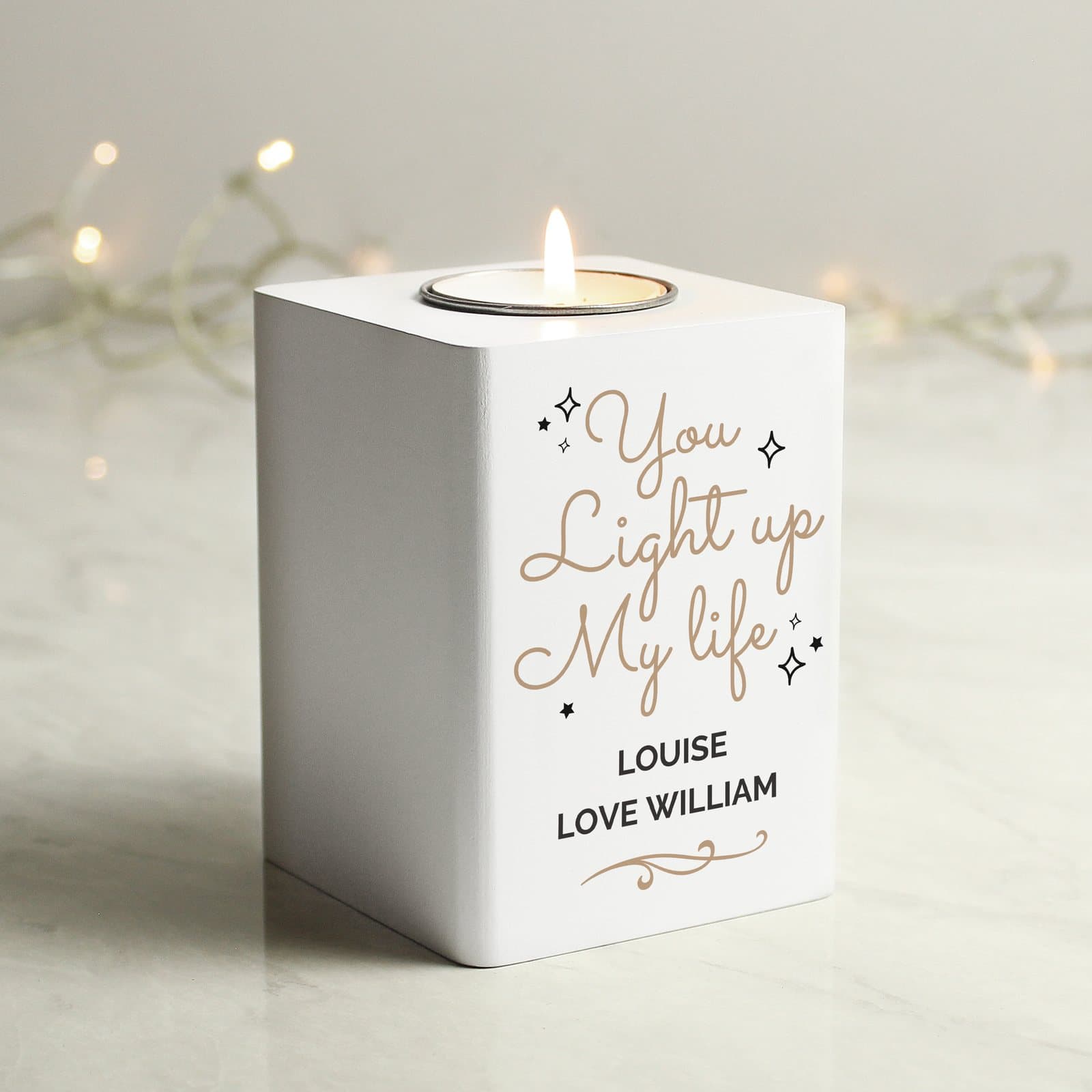 White wooden tea light holder with You light up my life message
