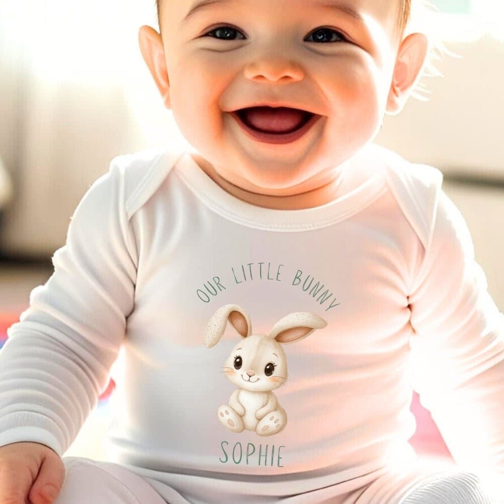Bunny design personalised baby grow, vest or bib with a name printed on it