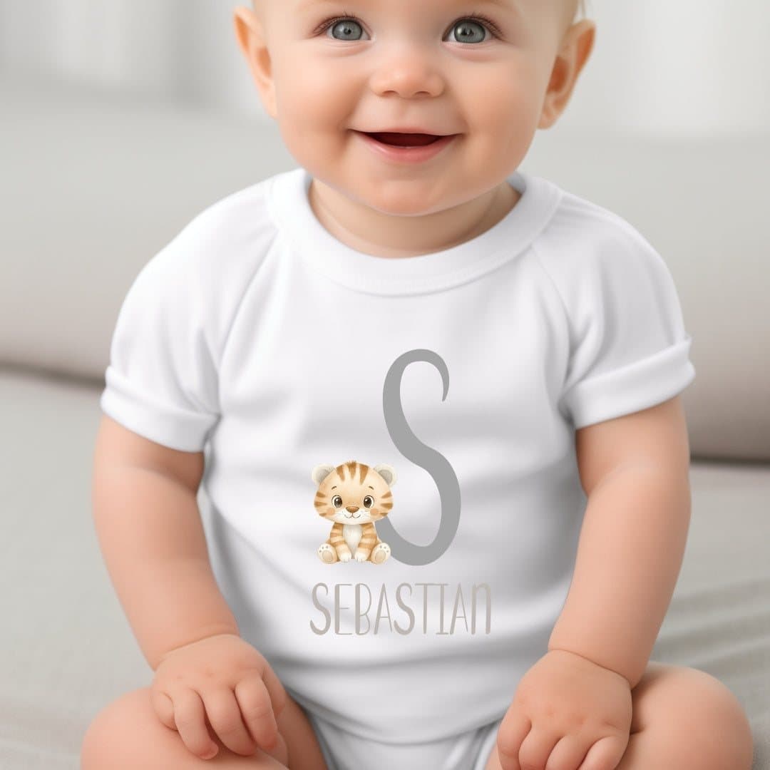 Personalised baby grow, vest or bib with a tiger design