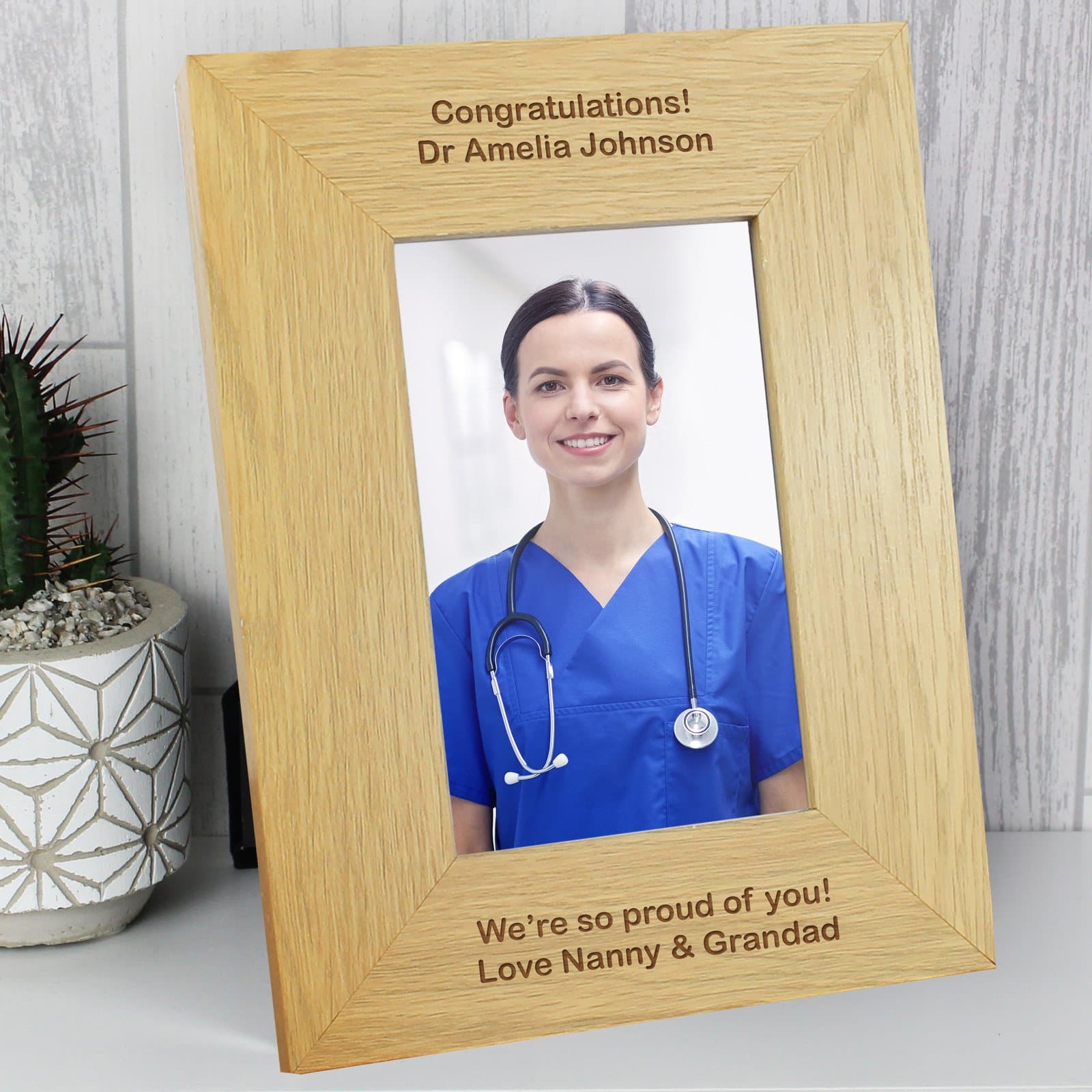 Oak veneer portrait photo frame with text above and below the photo