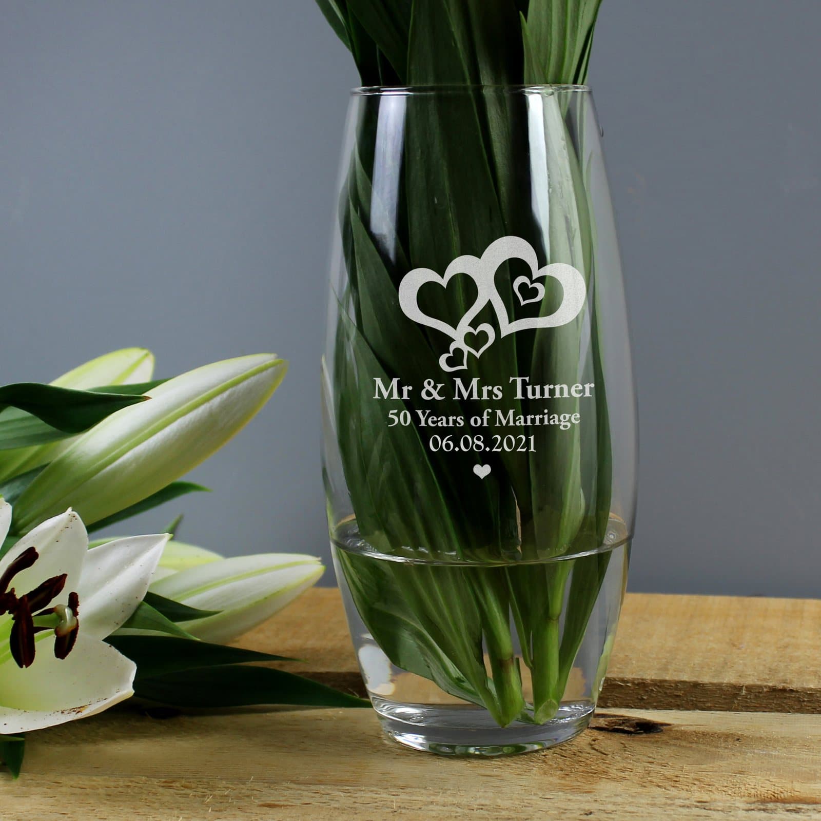 Glass bullet vase with a heart design and four lines of personalised text