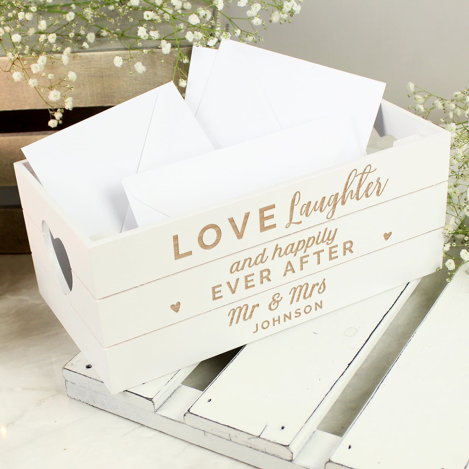 White wooden crate with heart shaped handles and personalised text