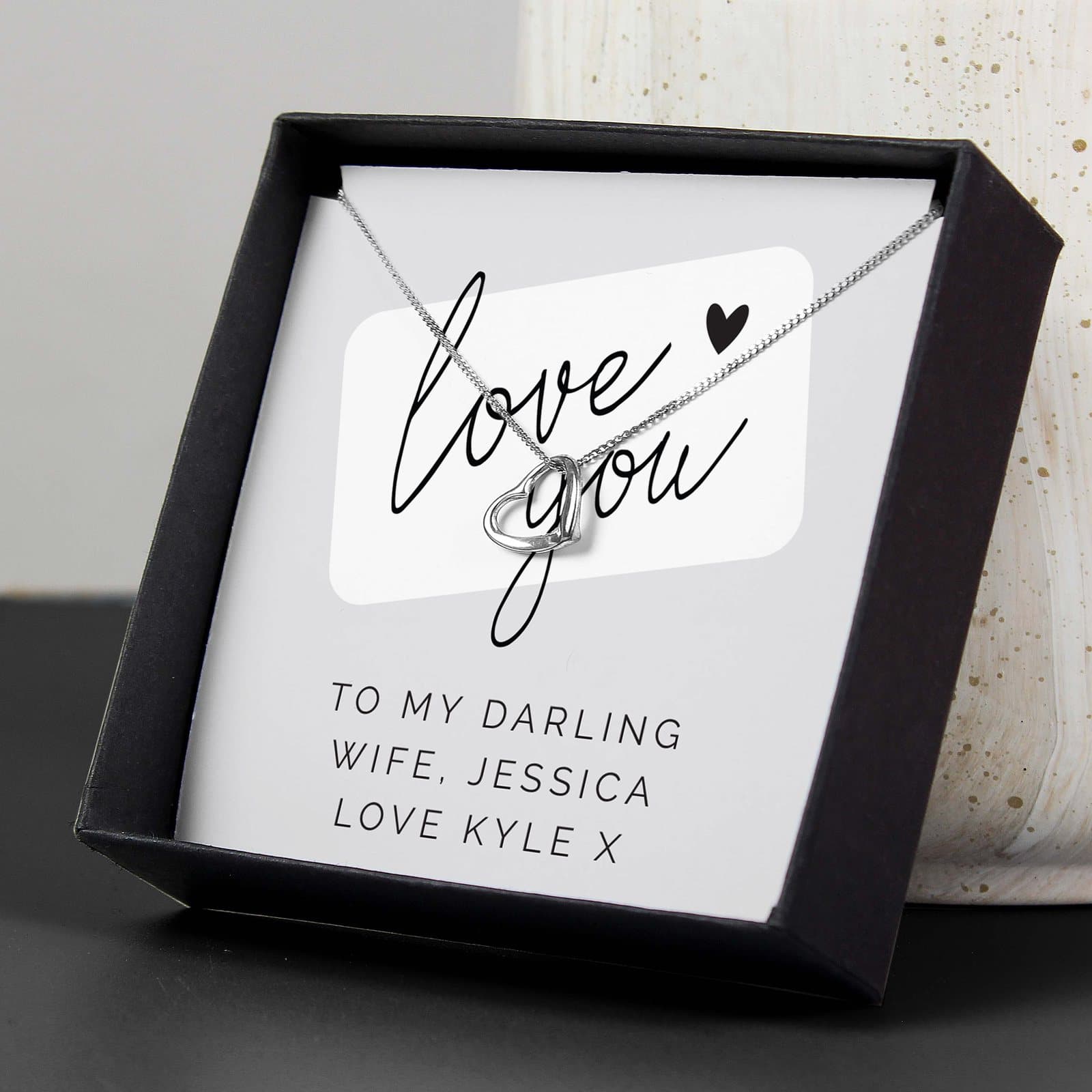 Sterling silver heart necklace with a black gift box