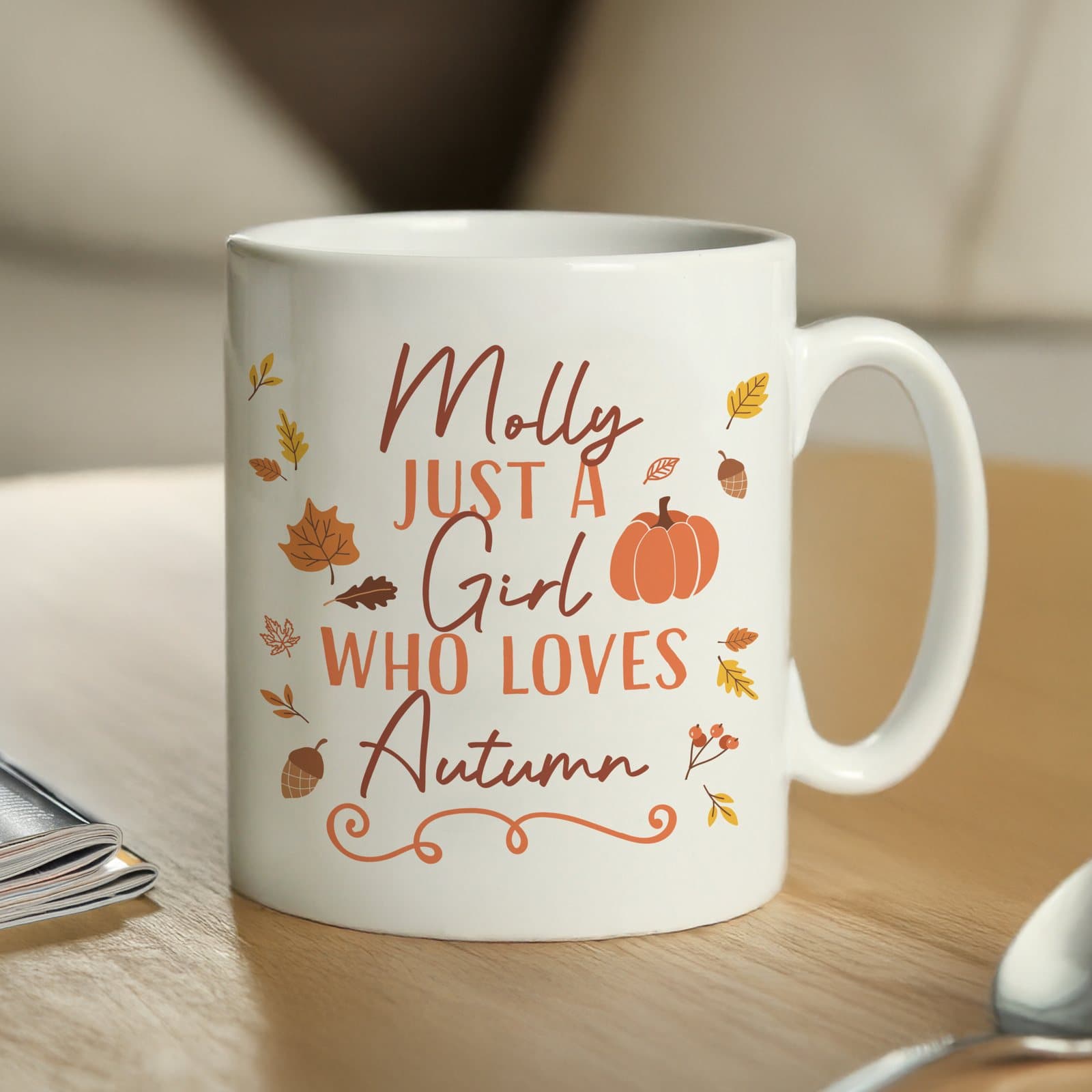 Personalised 11 oz ceramic mug with the phrase Just a Girl Who Loves Autumn