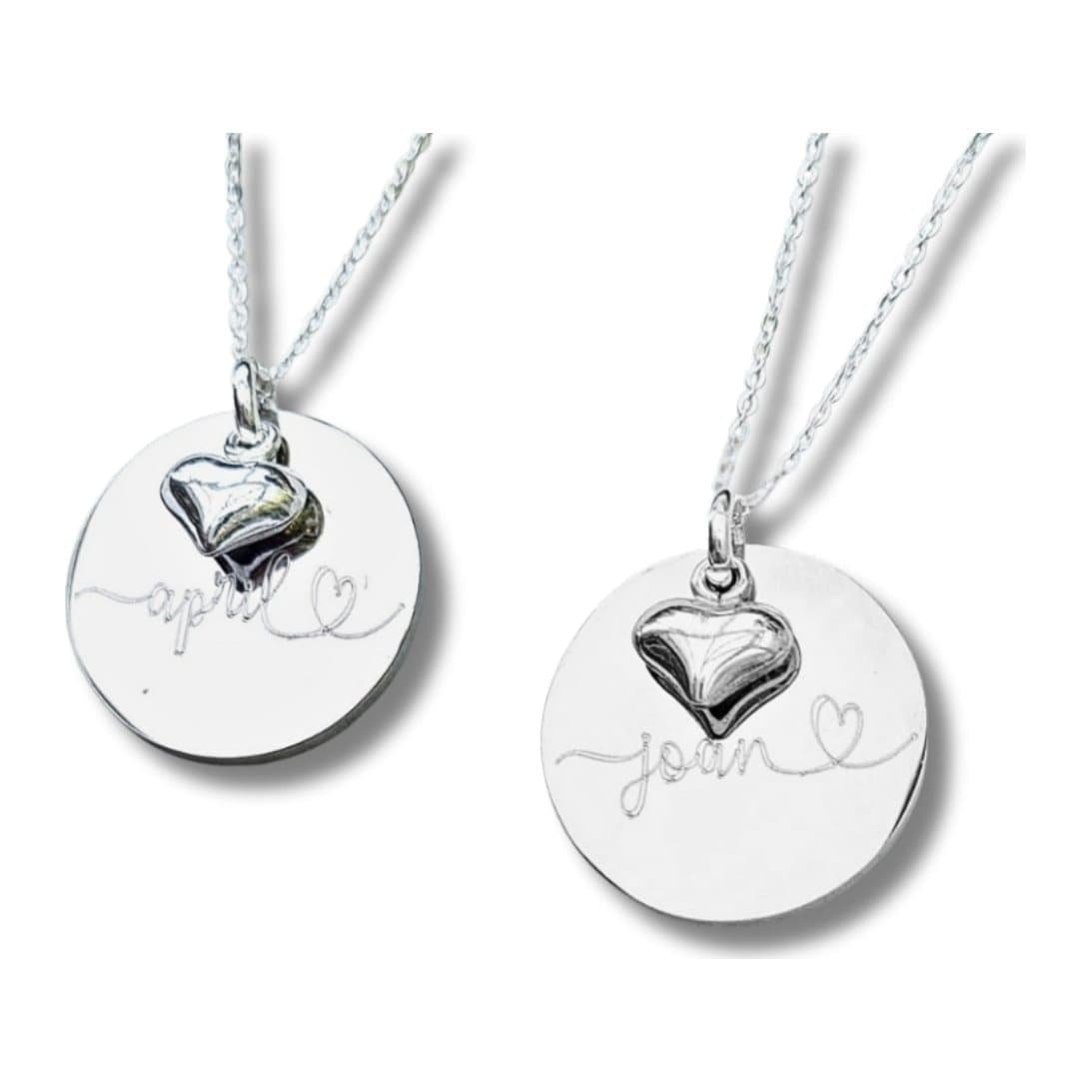 Personalised luxe necklace with a silver round charm and a small puff heart on a chain