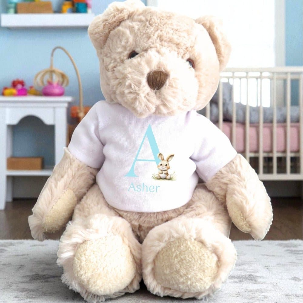 Personalised teddy bear wearing a printed bunny rabbit T-shirt with a blue initial