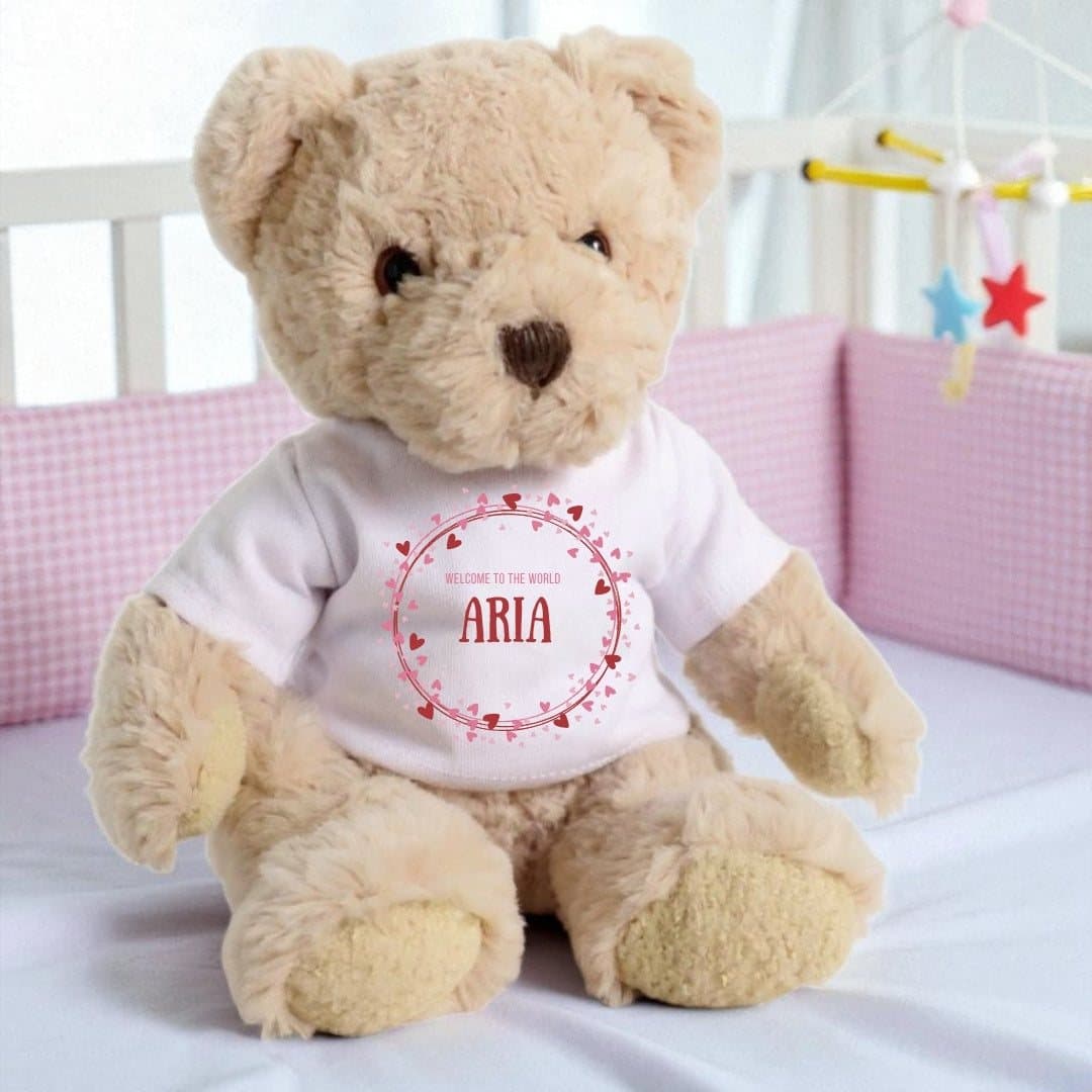 Personalised teddy bear in a T-shirt with pink and red hearts