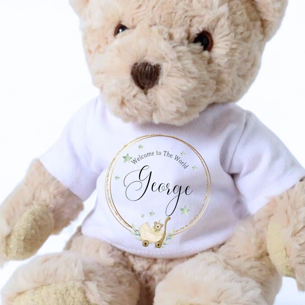Personalised teddy bear in a Welcome to the World T-shirt with a gold circle design