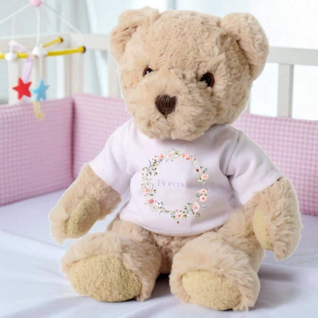 Teddy bear in a wild flower printed T-shirt with a personalised name
