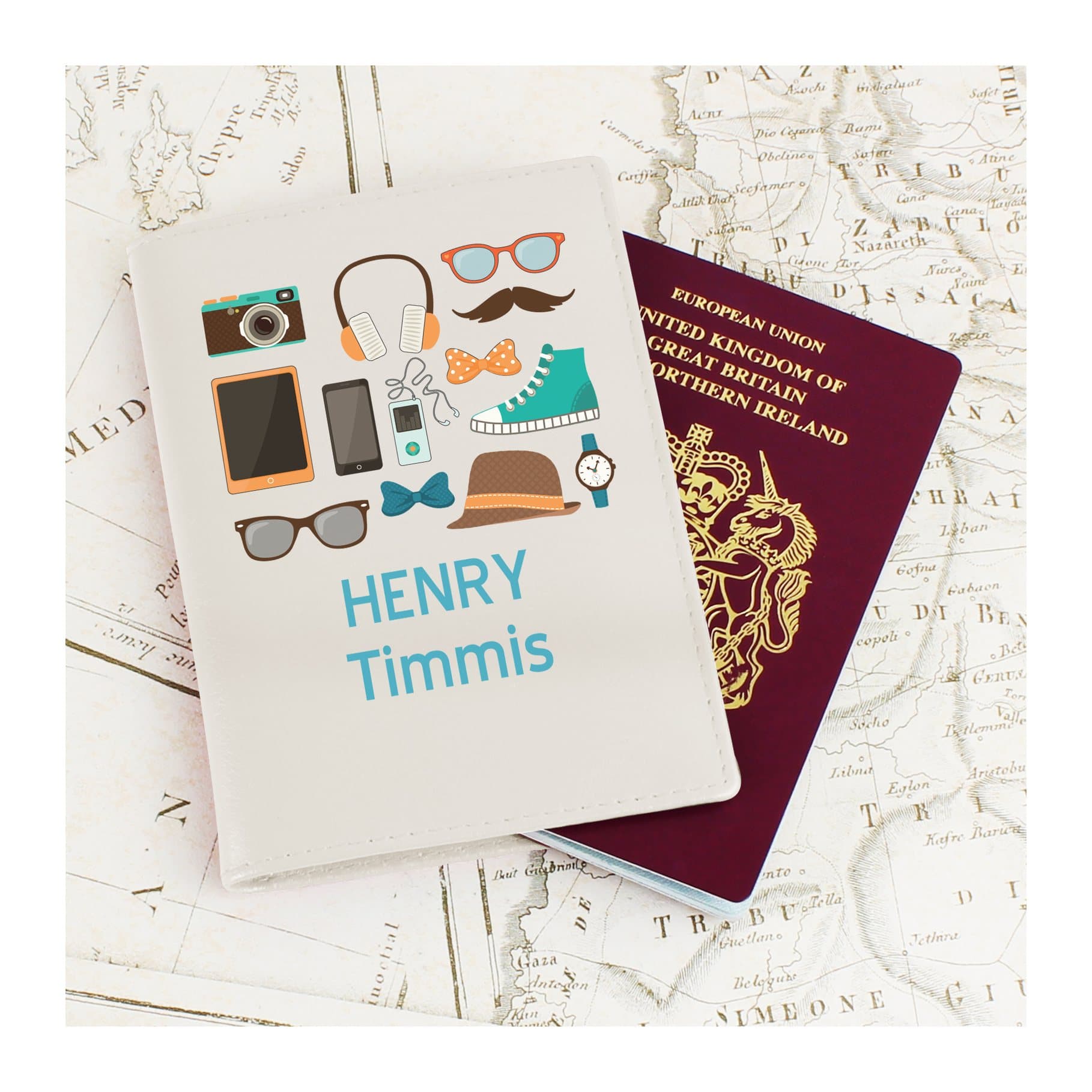 Cream leather passport holder with Male Essentials illustration and two lines of text