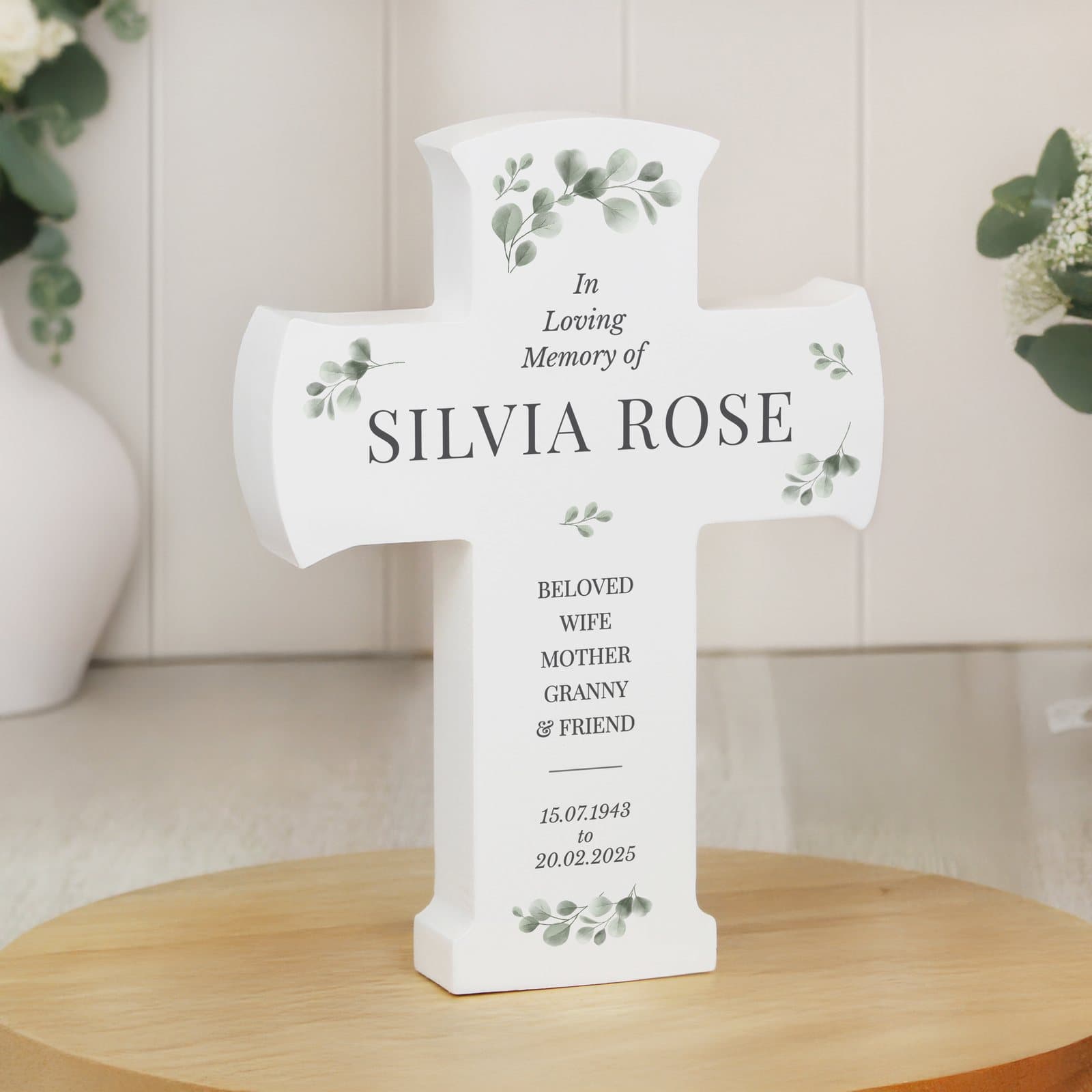 Wooden memorial cross ornament with personalised lines of text