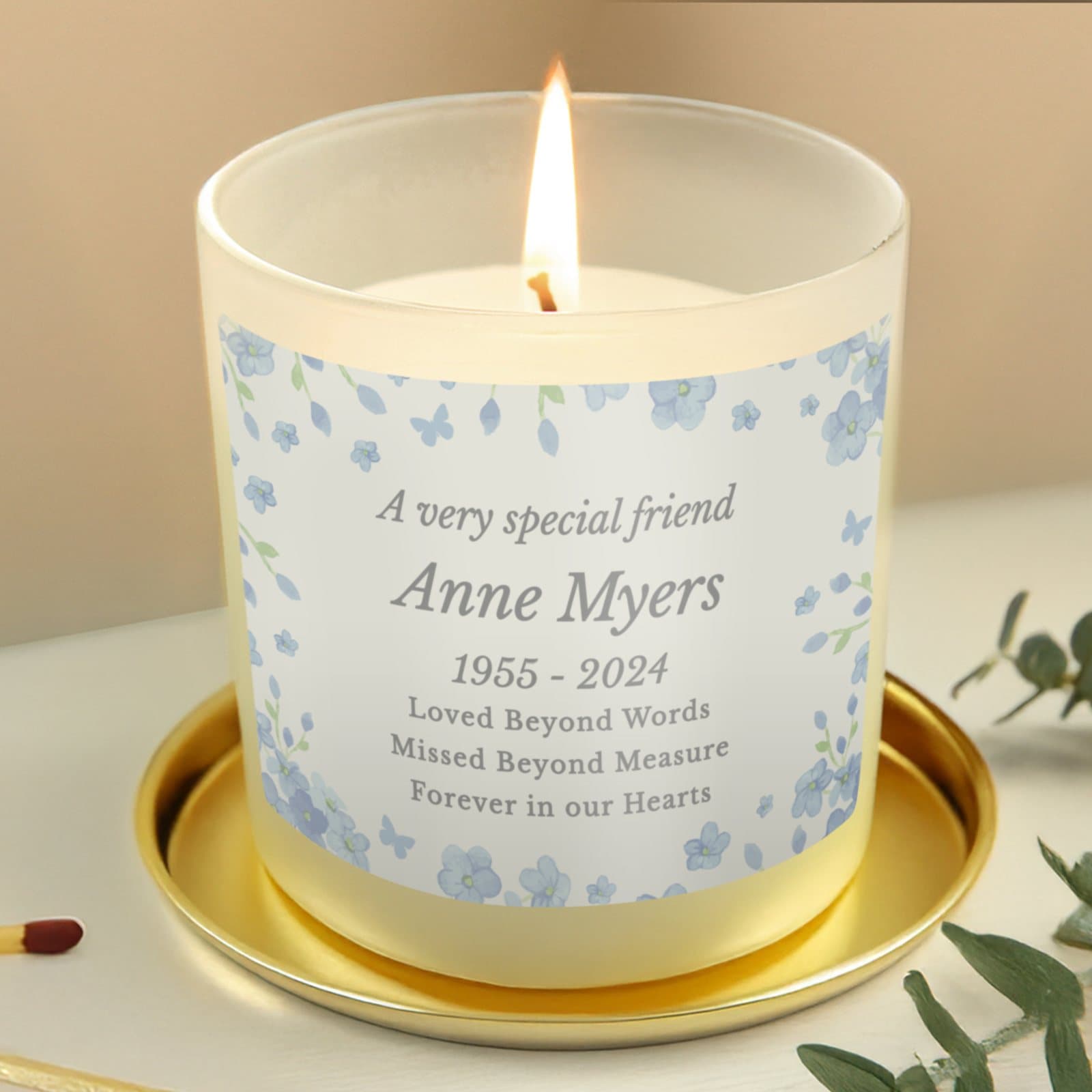 Vanilla jar candle with a Forget Me Not design and personalised memorial text