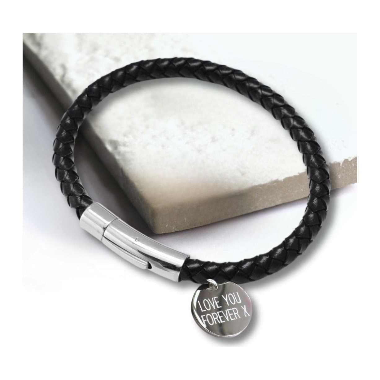 Black leather rope bracelet with a round polished stainless steel charm