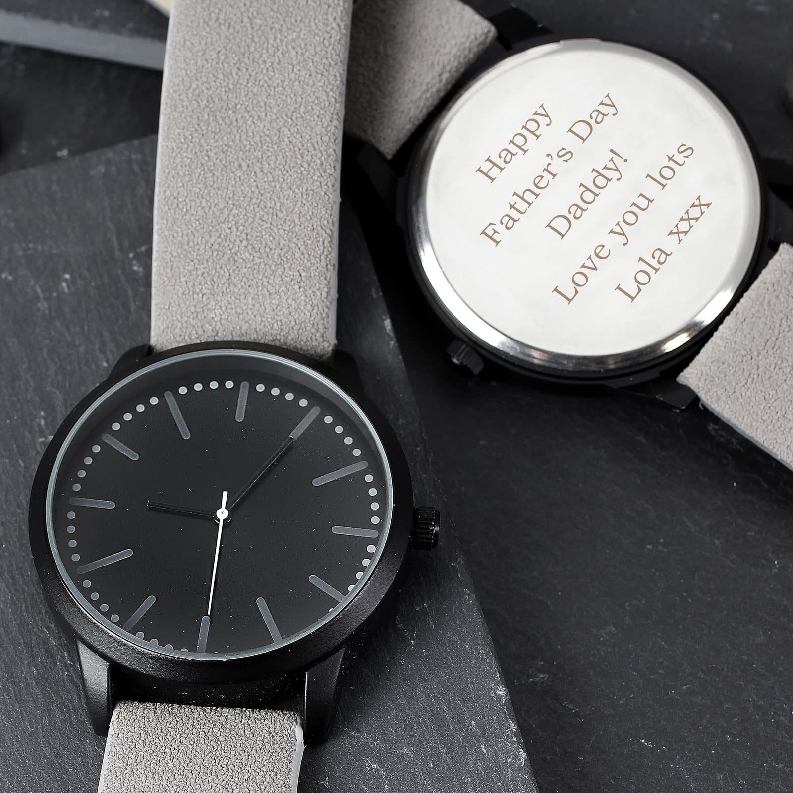 Matte black men's watch with a grey strap