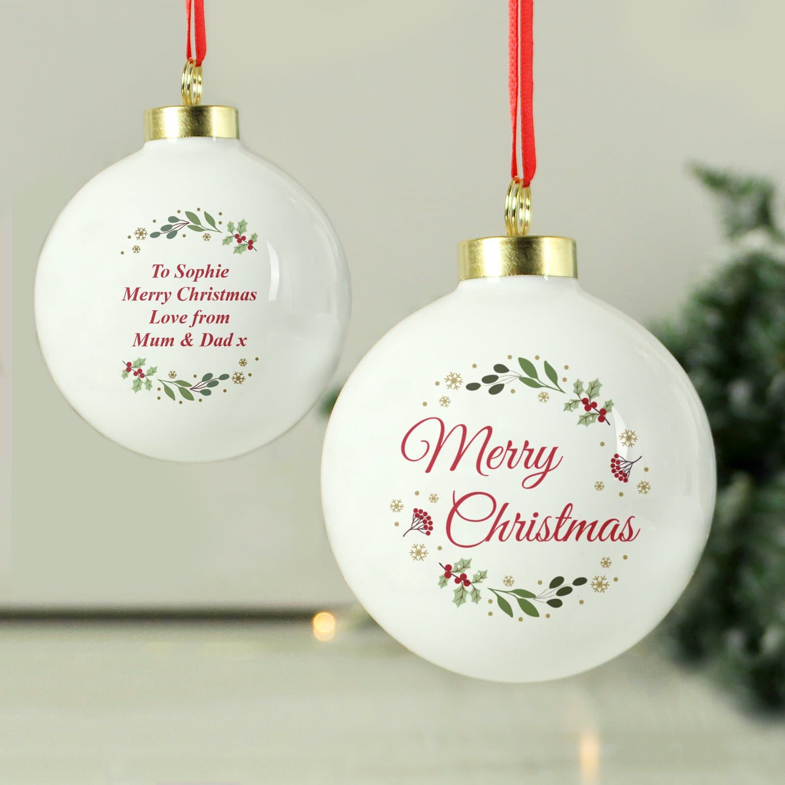 Merry Christmas bauble with a ribbon for hanging