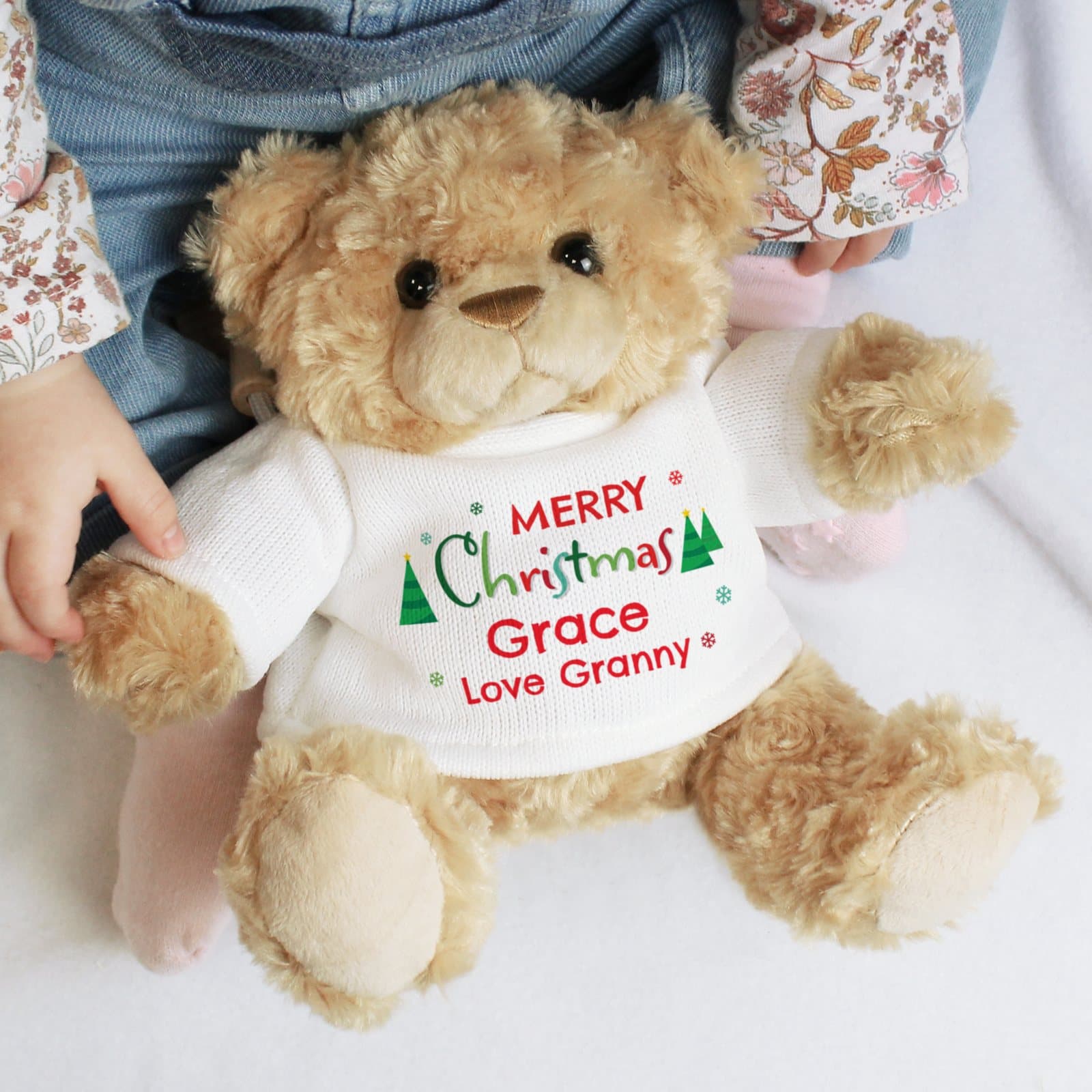Fluffy Merry Christmas teddy bear wearing a personalised T-shirt