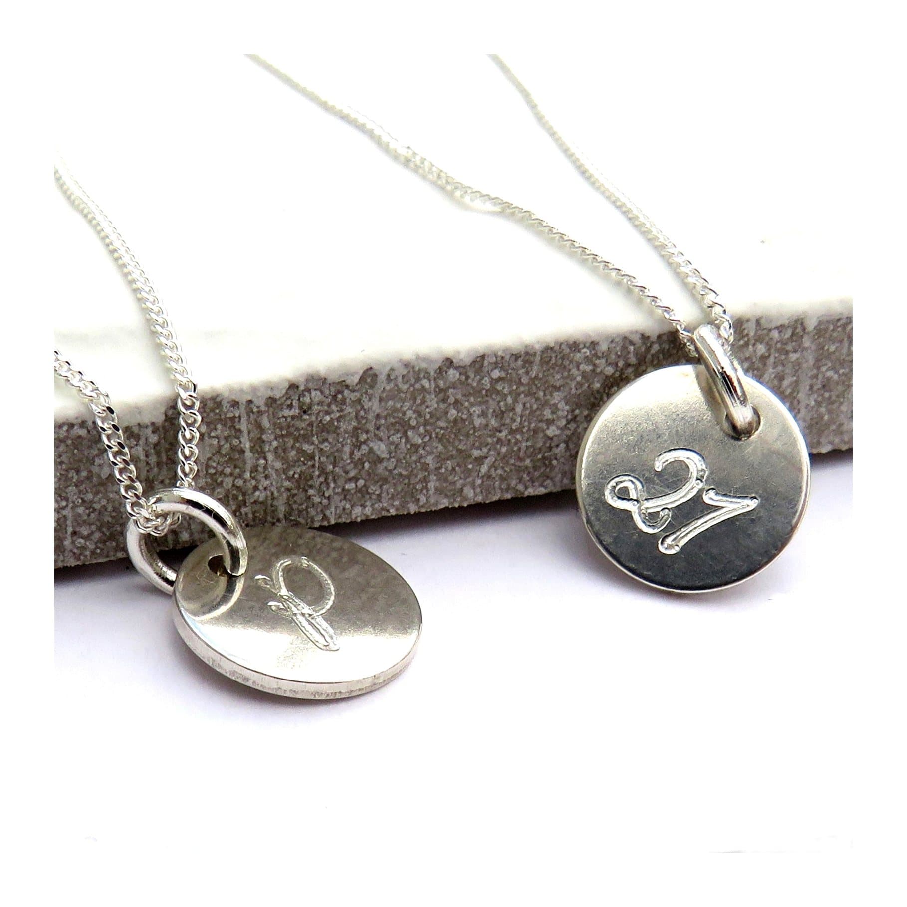 Personalised mini disc necklace: a round silver disc on a sterling silver chain