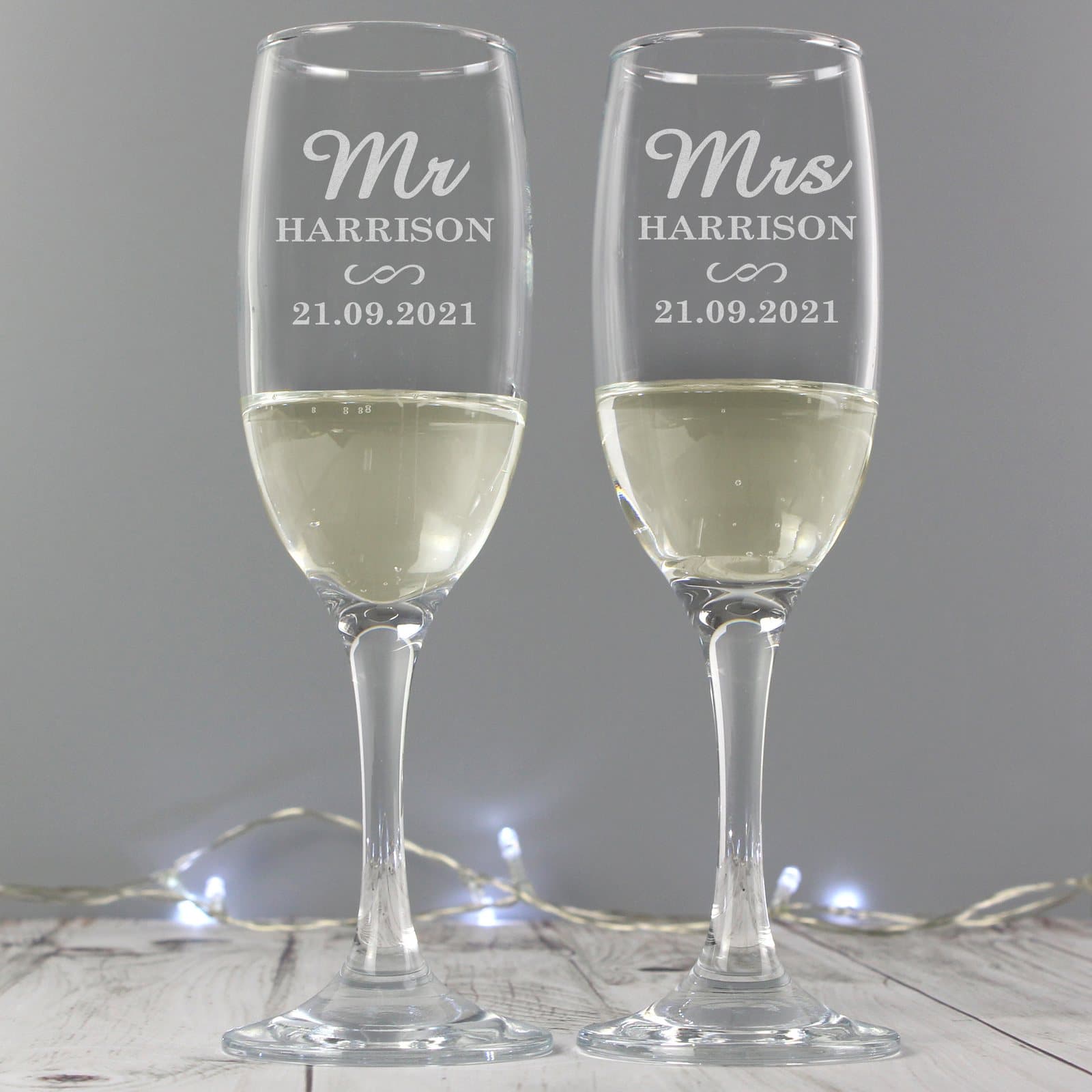Pair of glass flutes personalised with Mr & Mrs and two lines of text