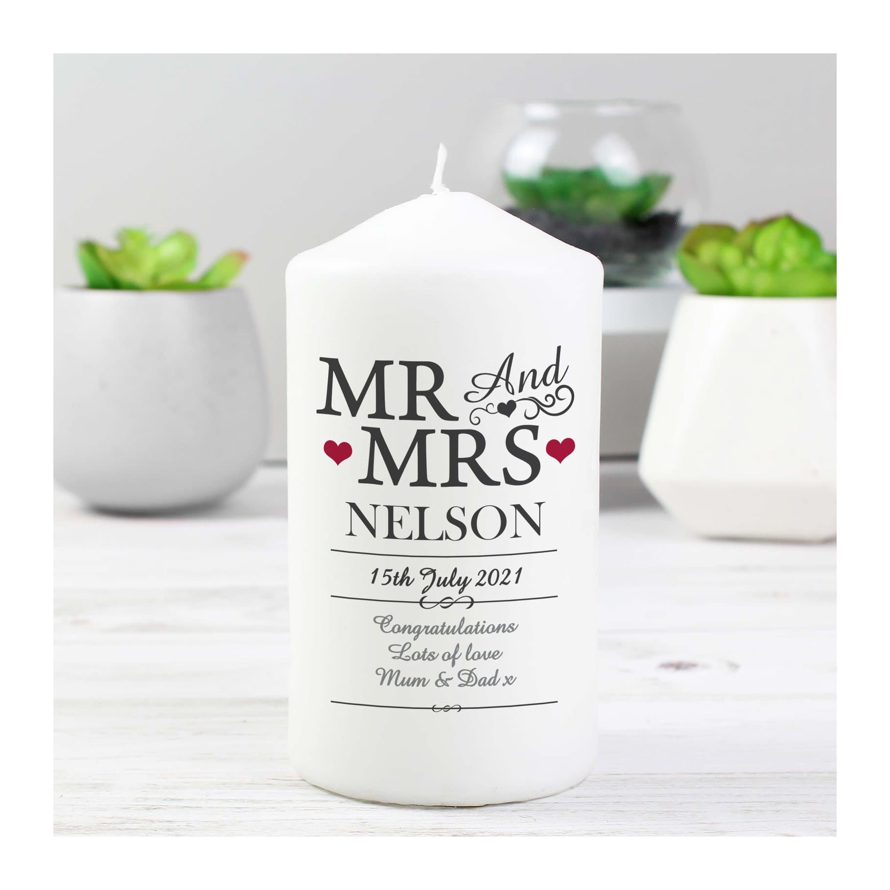 Mr & Mrs pillar candle with a white organza bag