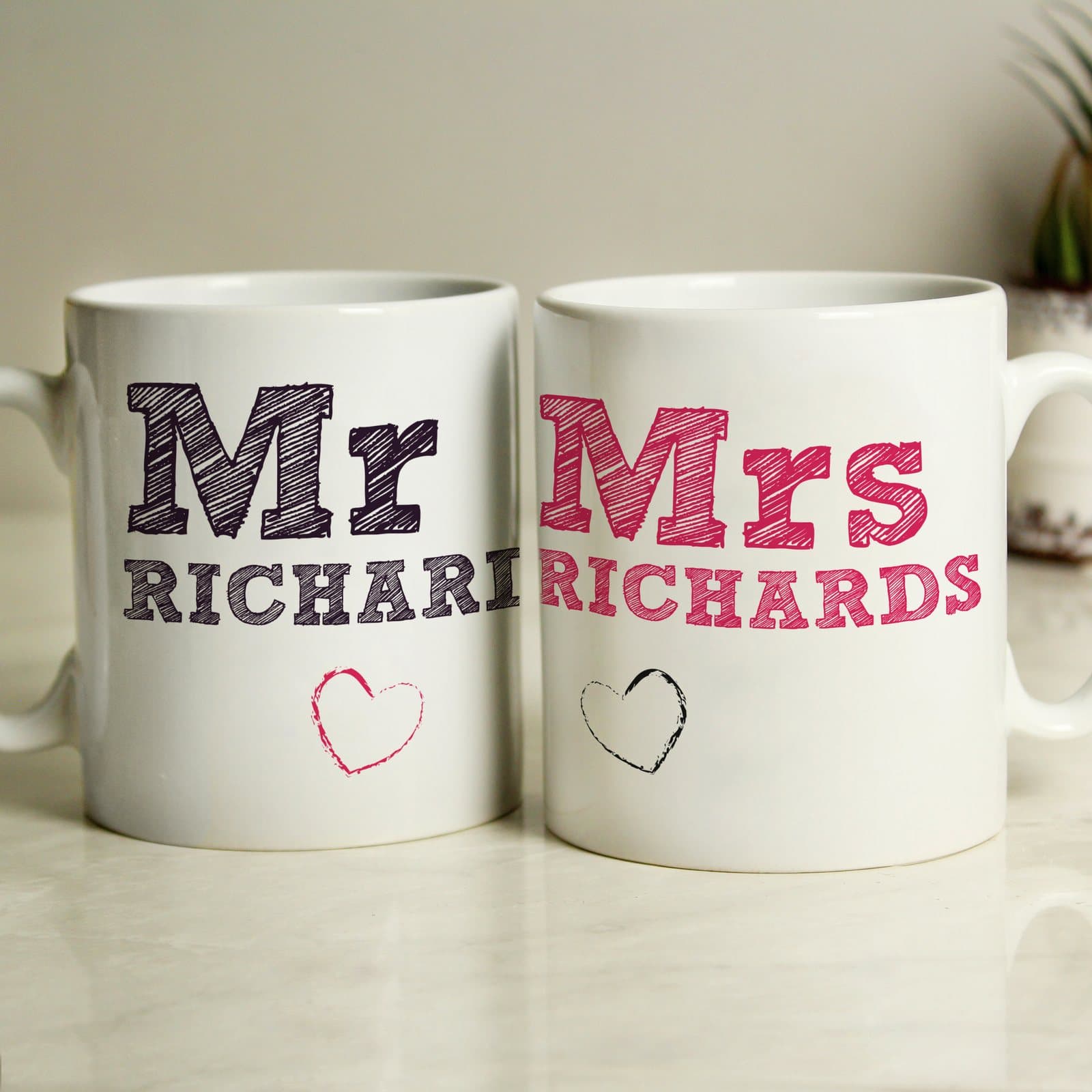 Pair of Mr and Mrs sketch ceramic mugs with a surname