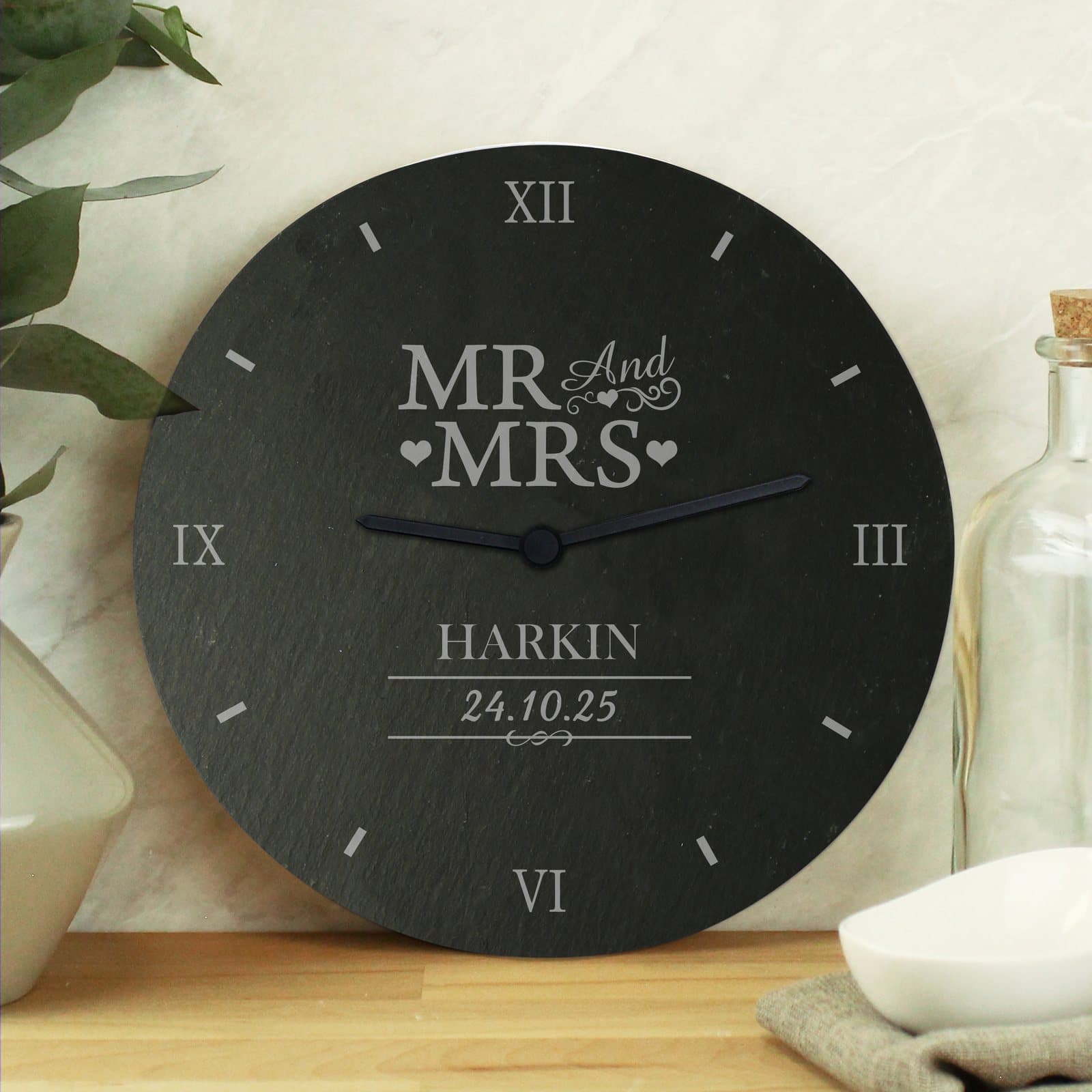 Square rustic slate clock with Mr and Mrs text, a surname and a date