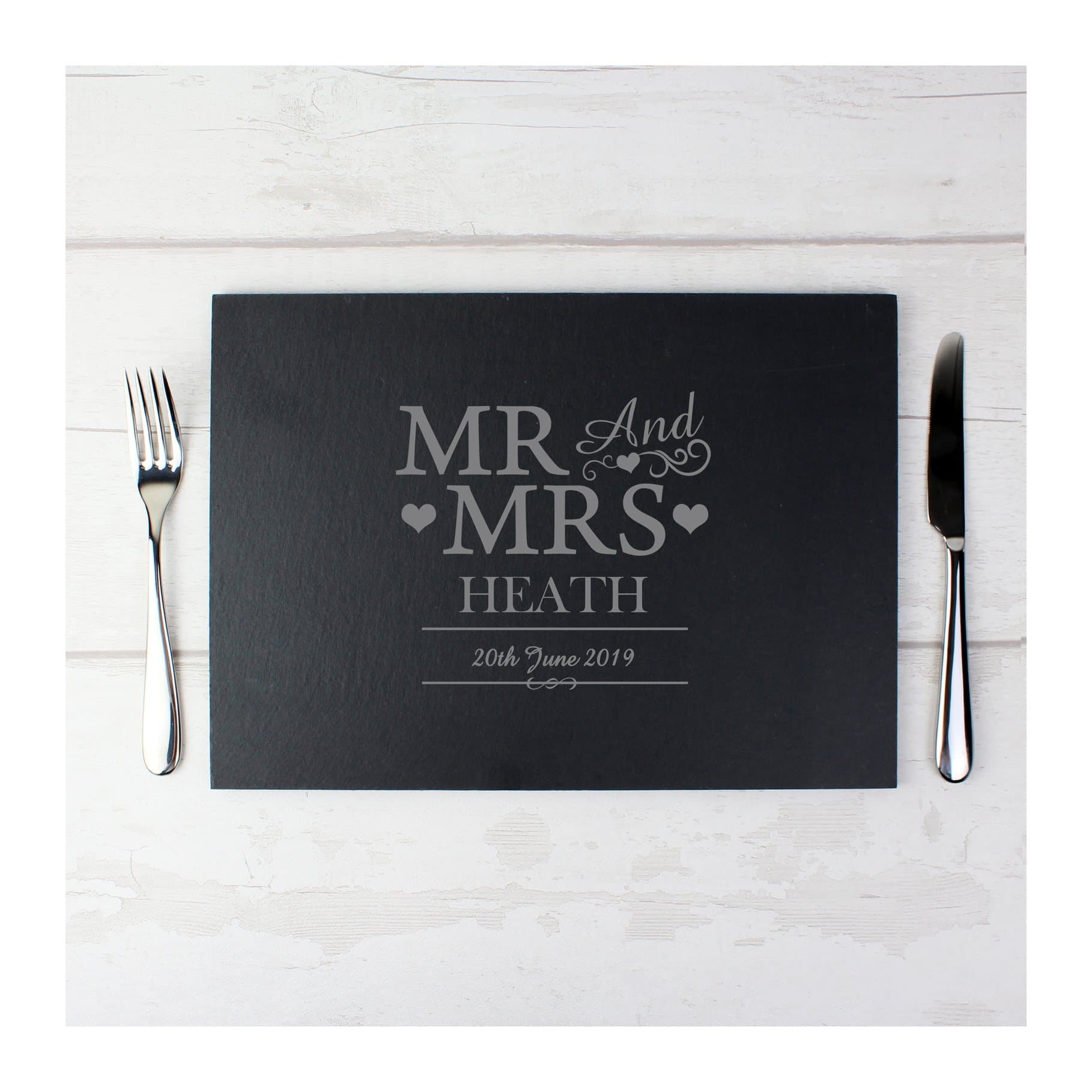 Rustic slate placemat with Mr & Mrs text, a surname and a date