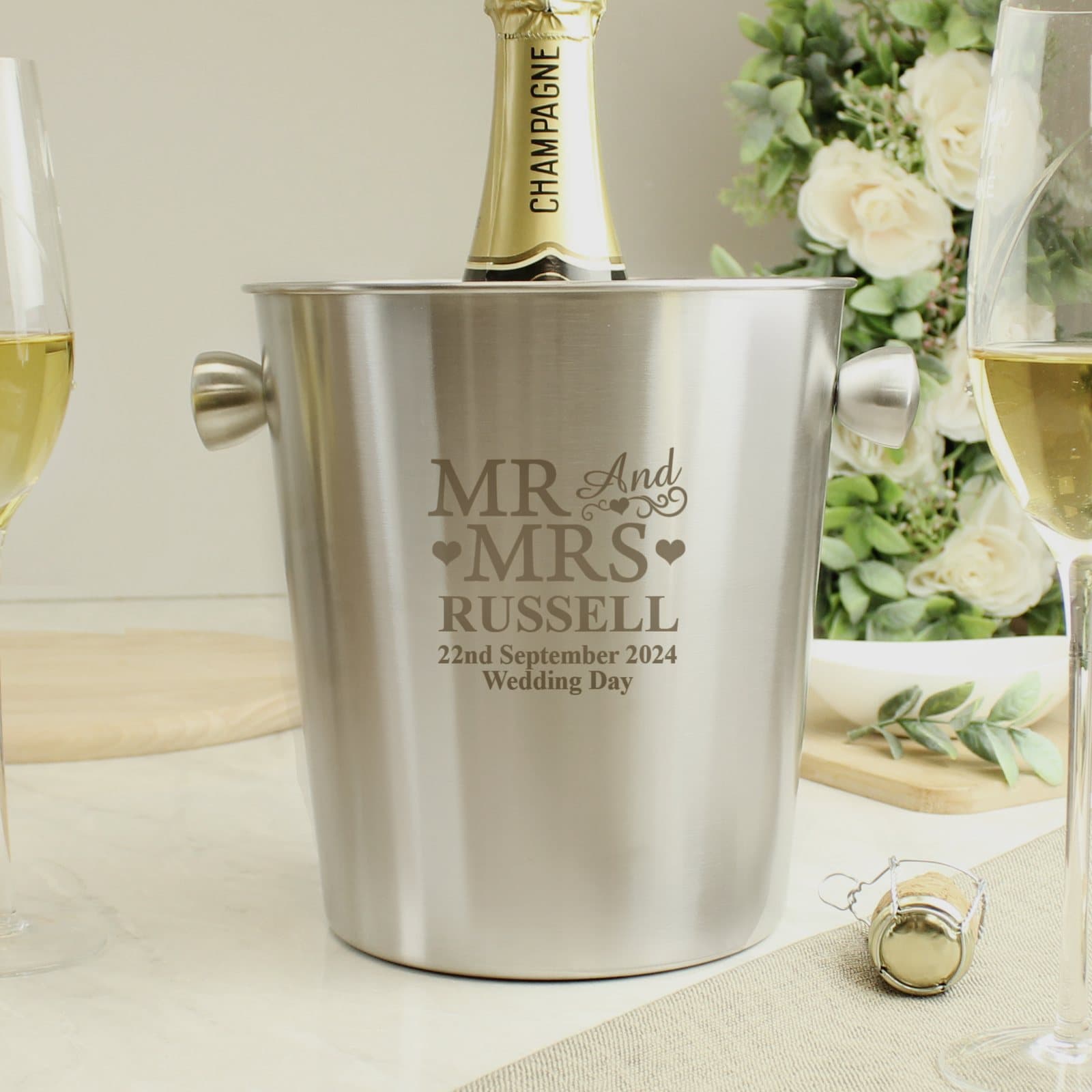 Stainless steel ice bucket with Mr & Mrs text, a surname, date and message