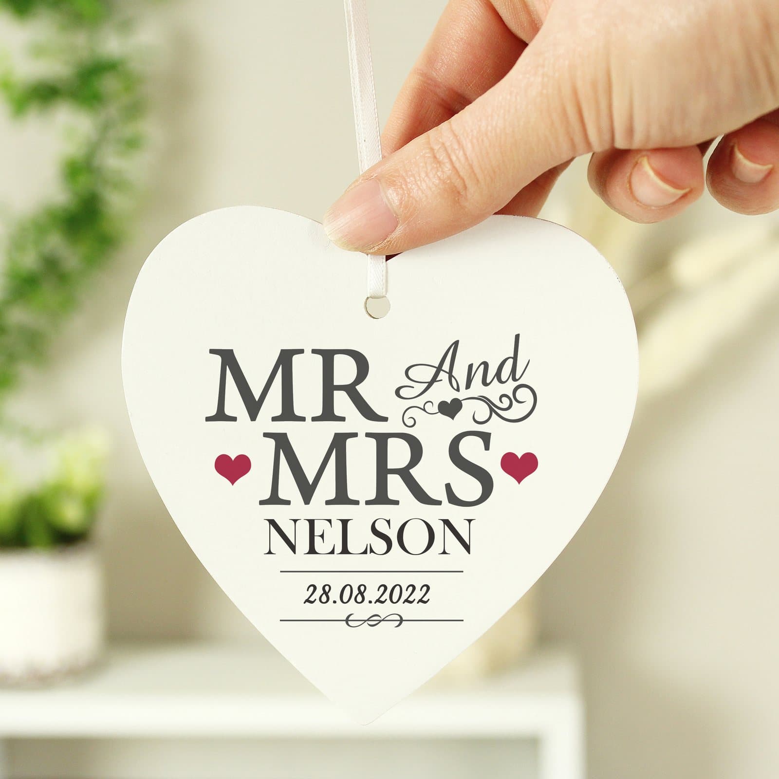 Wooden heart decoration reading Mr & Mrs with ribbon
