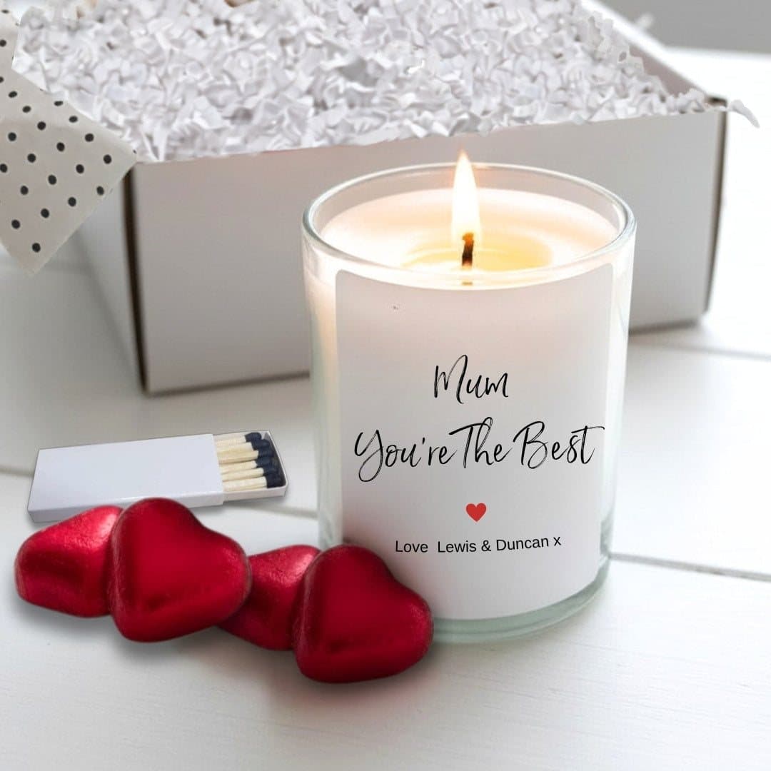 Personalised scented candle with four red foiled chocolate hearts and matches