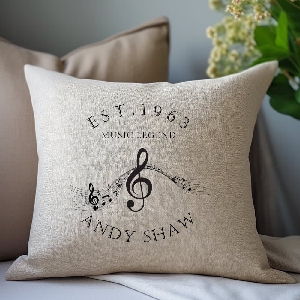 Cream personalised cushion with a name, birth year and musical notes
