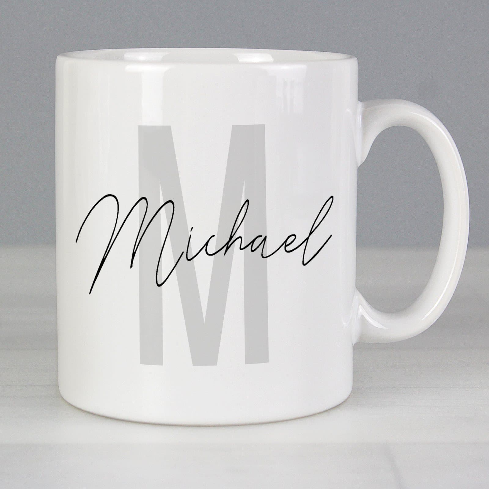 Personalised ceramic mug with a name and initial