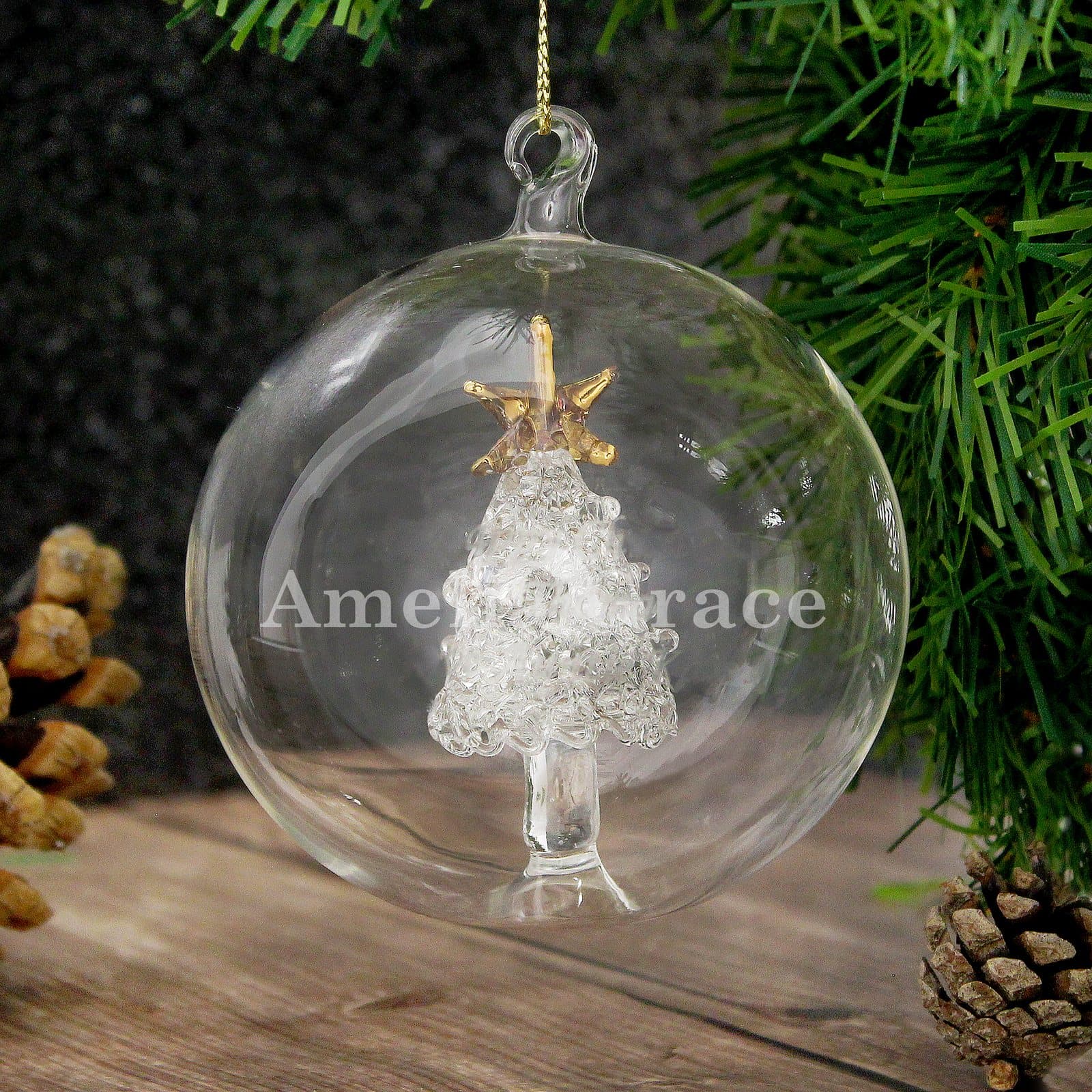 Glass bauble with a glass Christmas tree inside