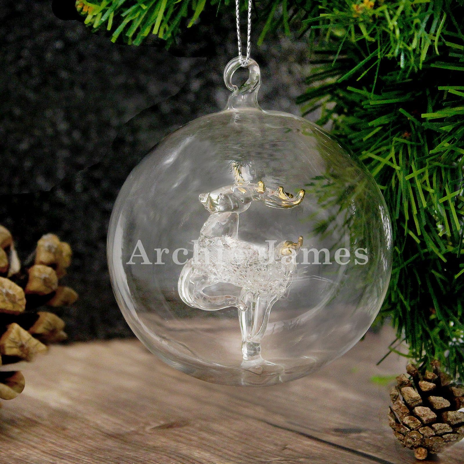Glass bauble with a glass reindeer inside