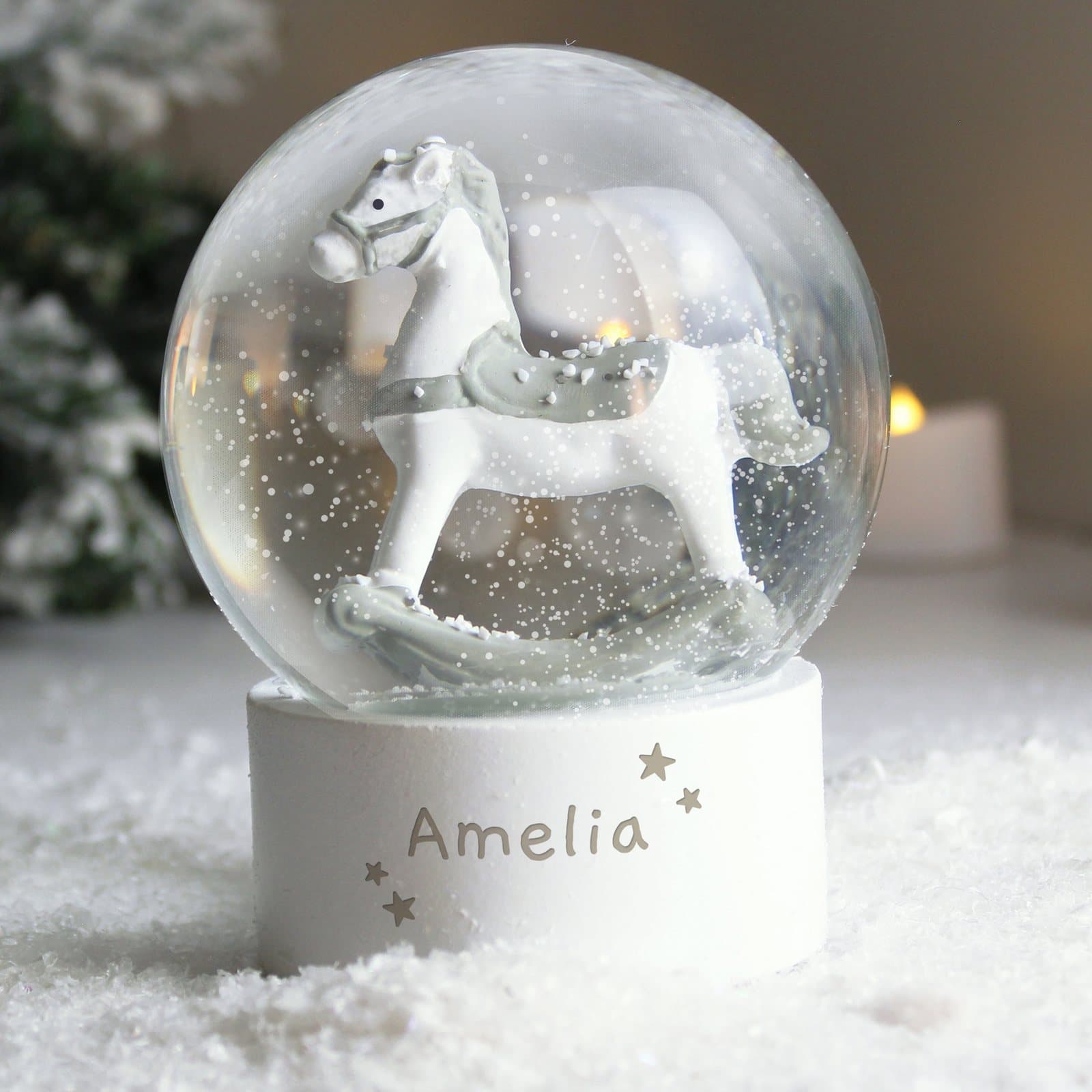 Personalised rocking horse glitter snow globe in resin and plastic